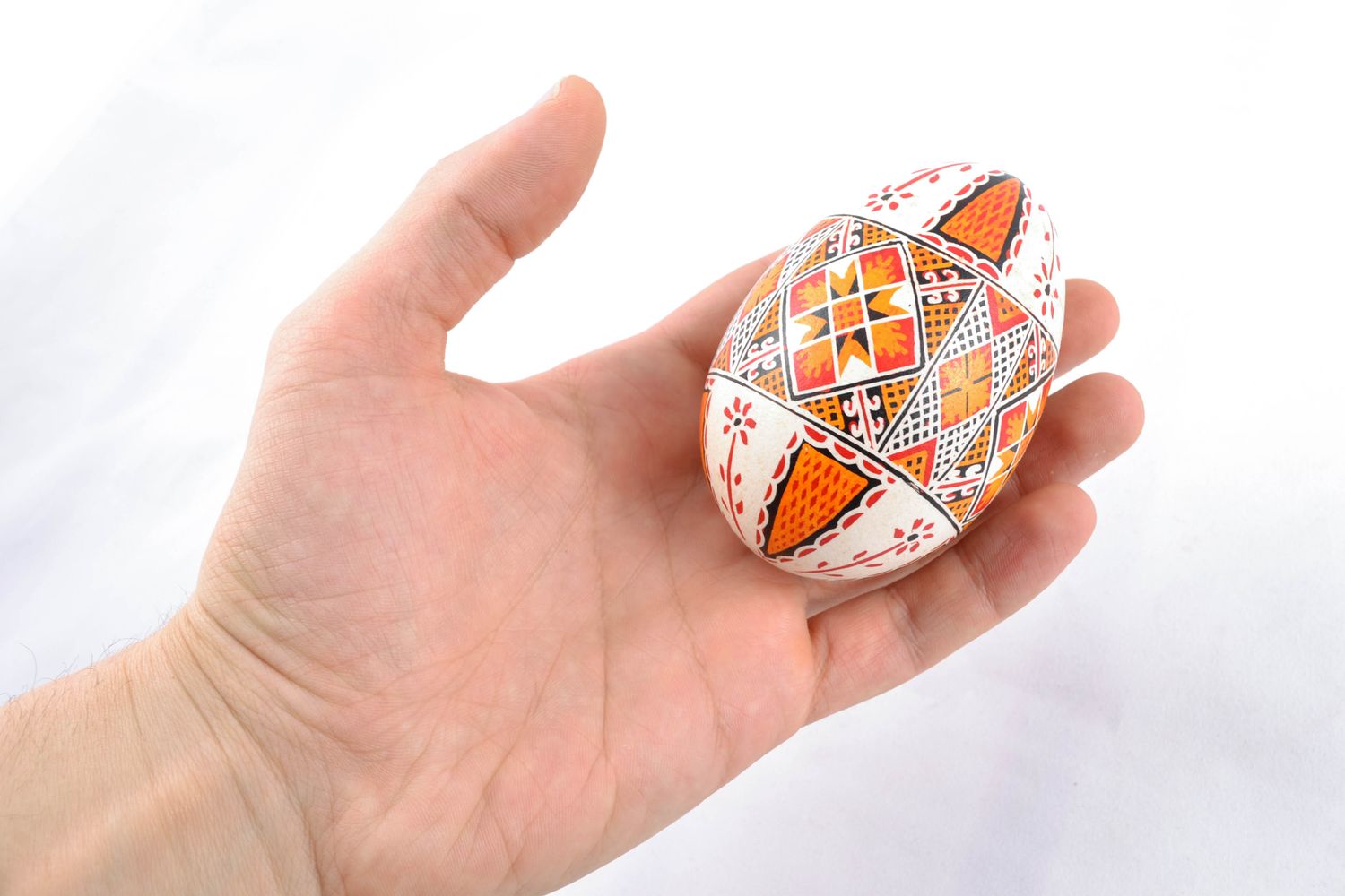 Handmade decorative painted egg of light colors photo 2