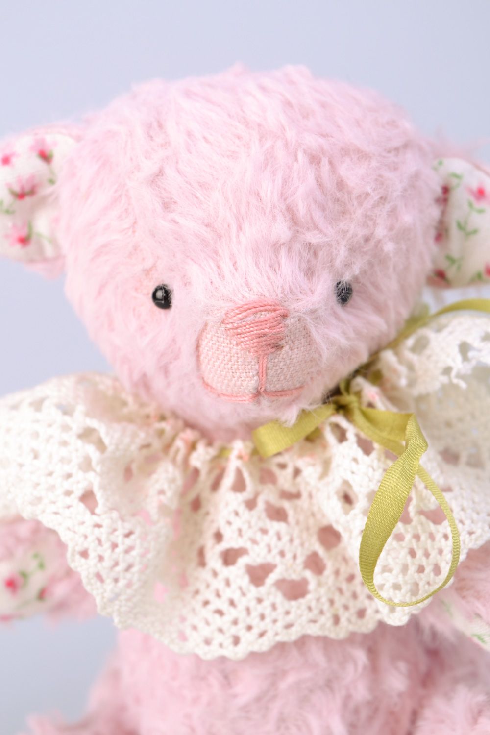 Handmade designer soft toy bear sewn of fabric of pink color with lacy collar  photo 3