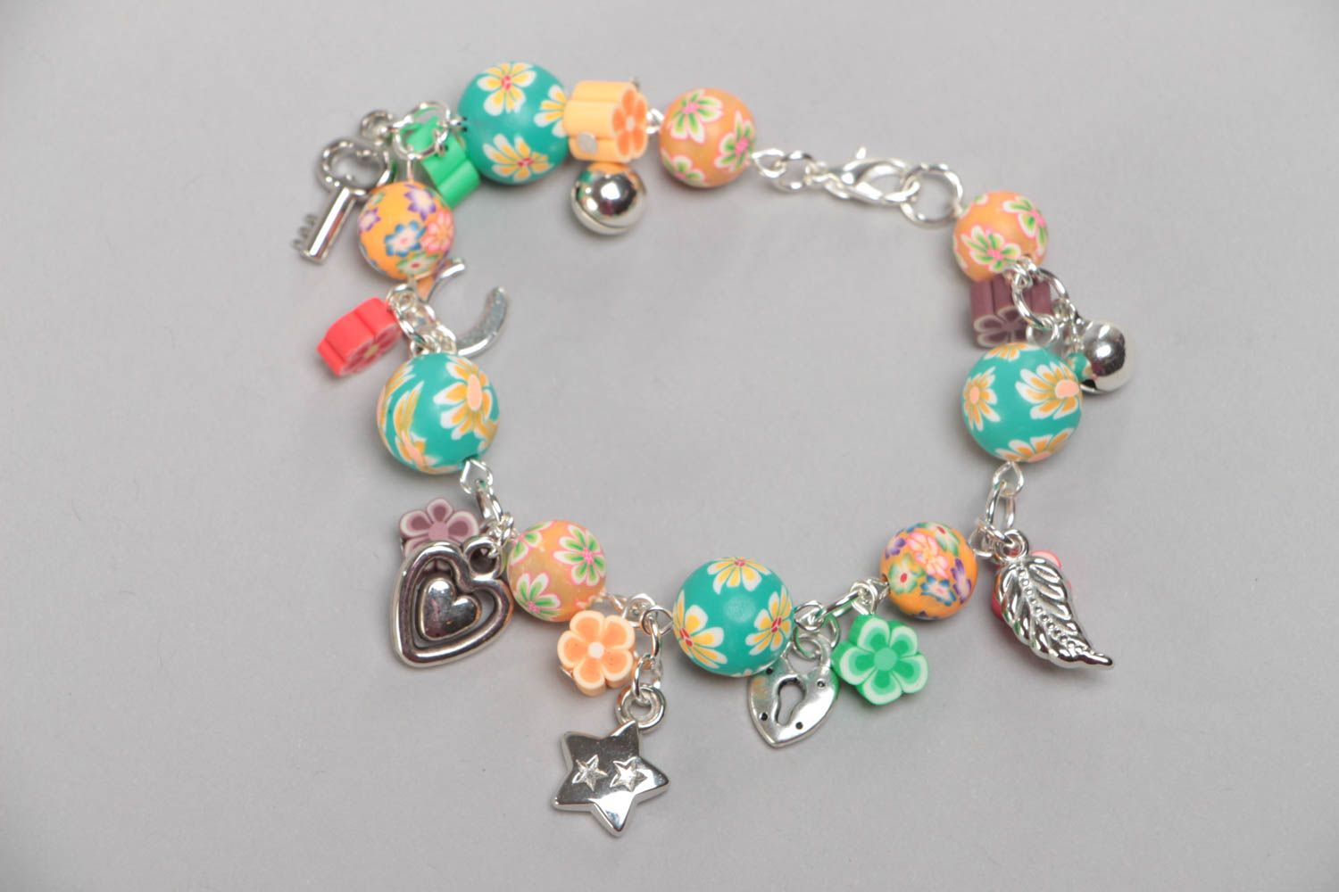 Beautiful children's designer handmade polymer clay bracelet with charms photo 3