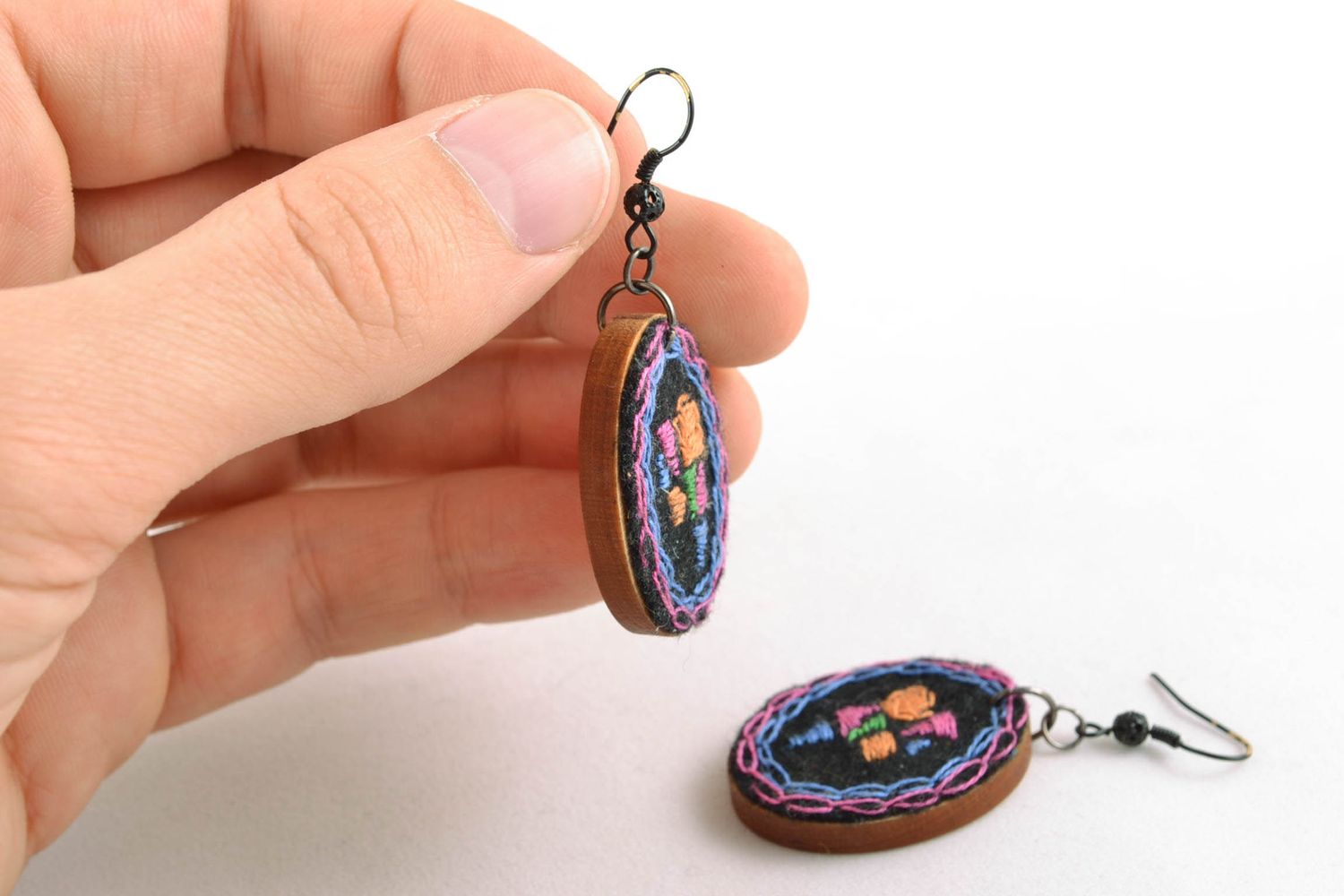 Designer fashionable embroidered earrings of oval shape photo 2