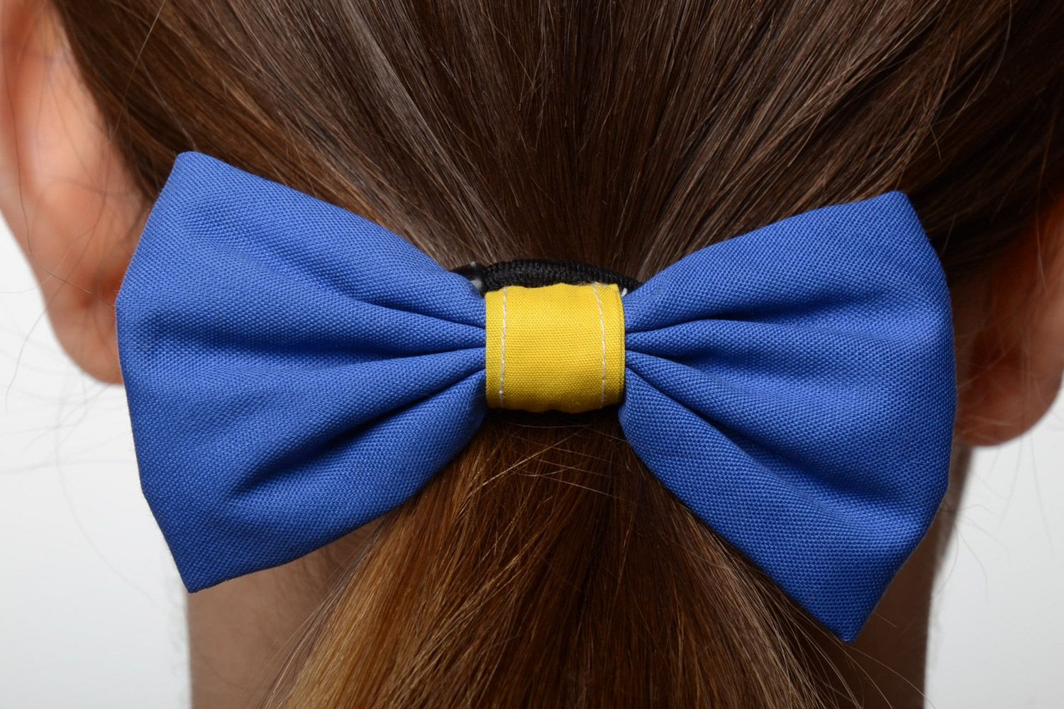 Unusual handmade blue cotton fabric bow hair tie photo 1