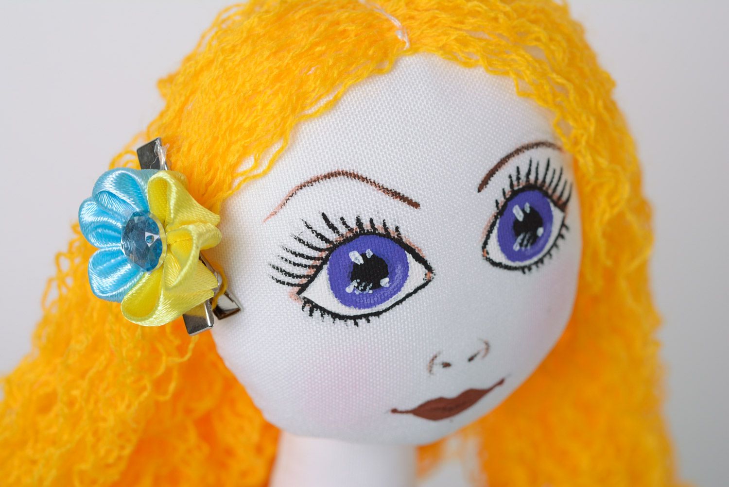 Handmade fabric soft doll of average size with yellow hair in dress photo 2
