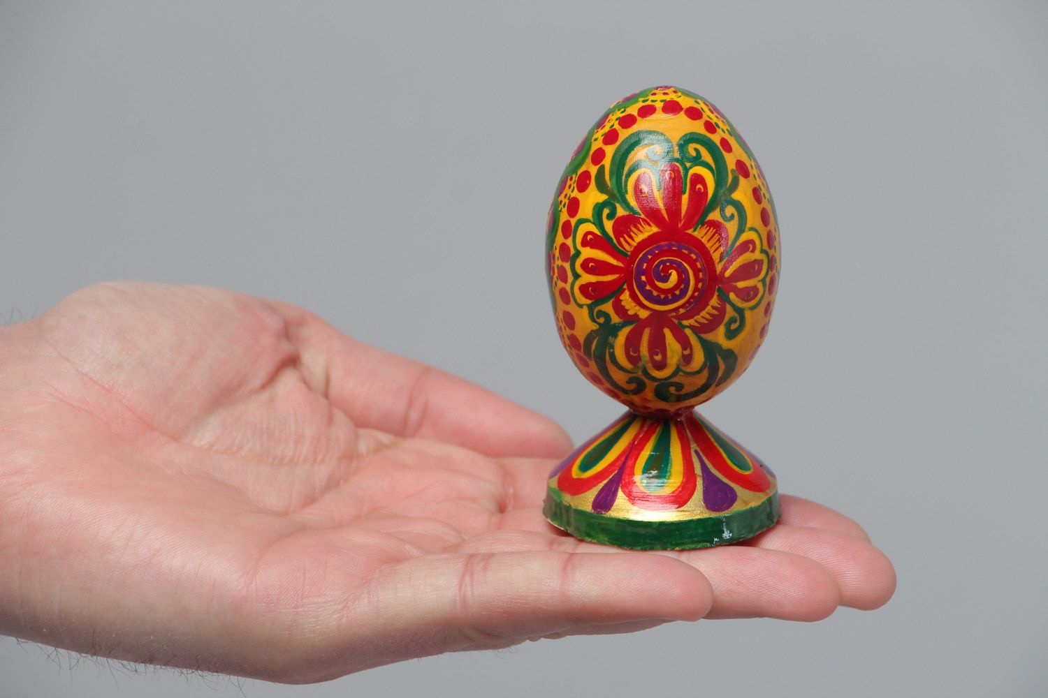 Handmade painted wooden decorative Easter egg on stand interior decor photo 5