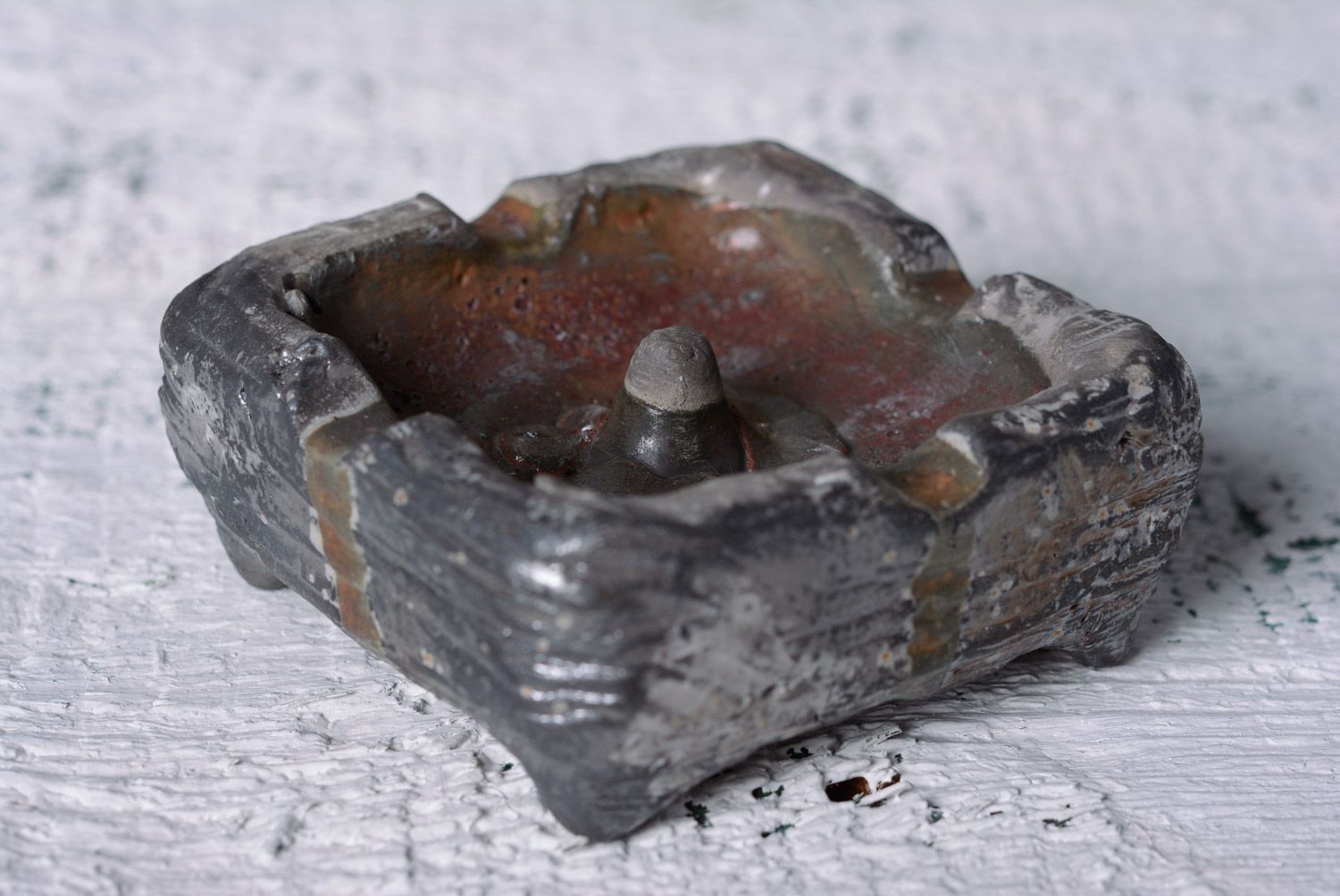 Handmade dark gray ceramic ashtray of square shape kilned with limited aeration  photo 1