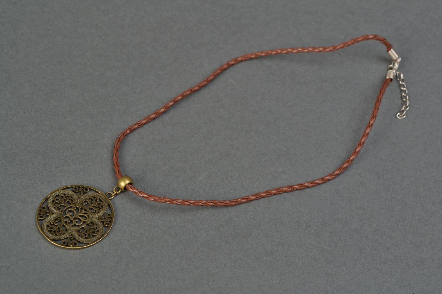 Metal pendant with cord Flower photo 1