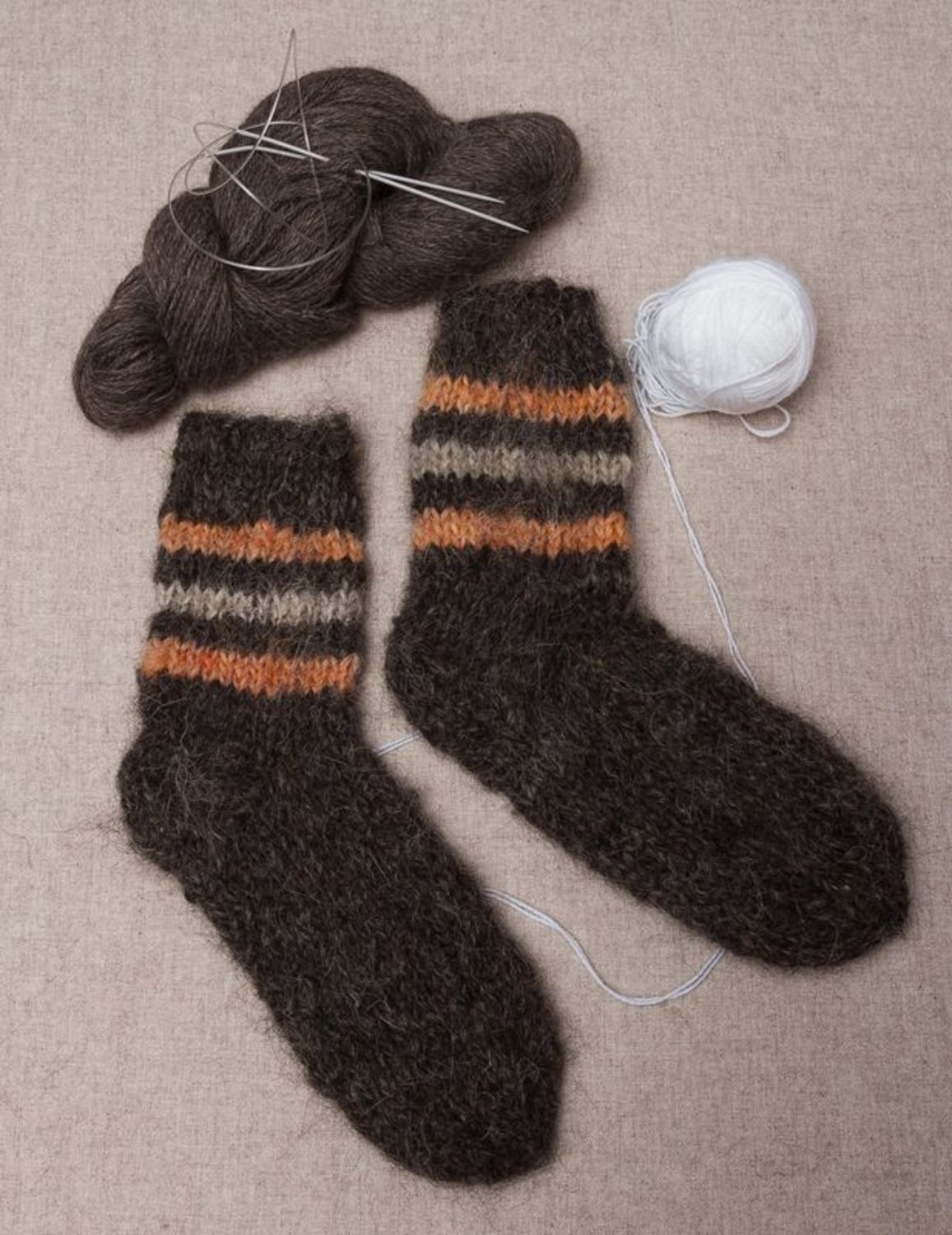 Warm woolen socks of dark gray color photo 1