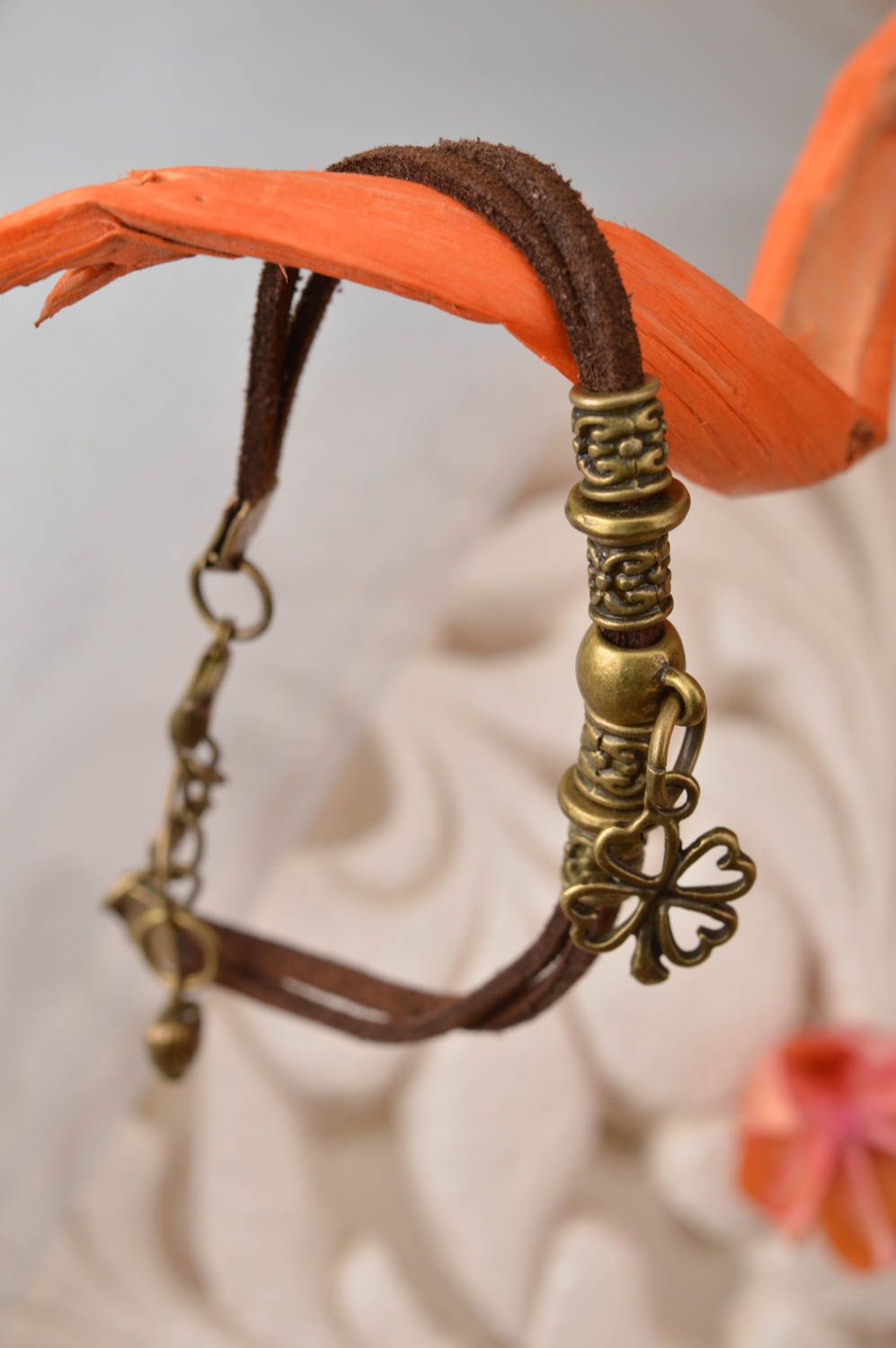 Beautiful handmade brown suede cord bracelet with metal charm photo 1
