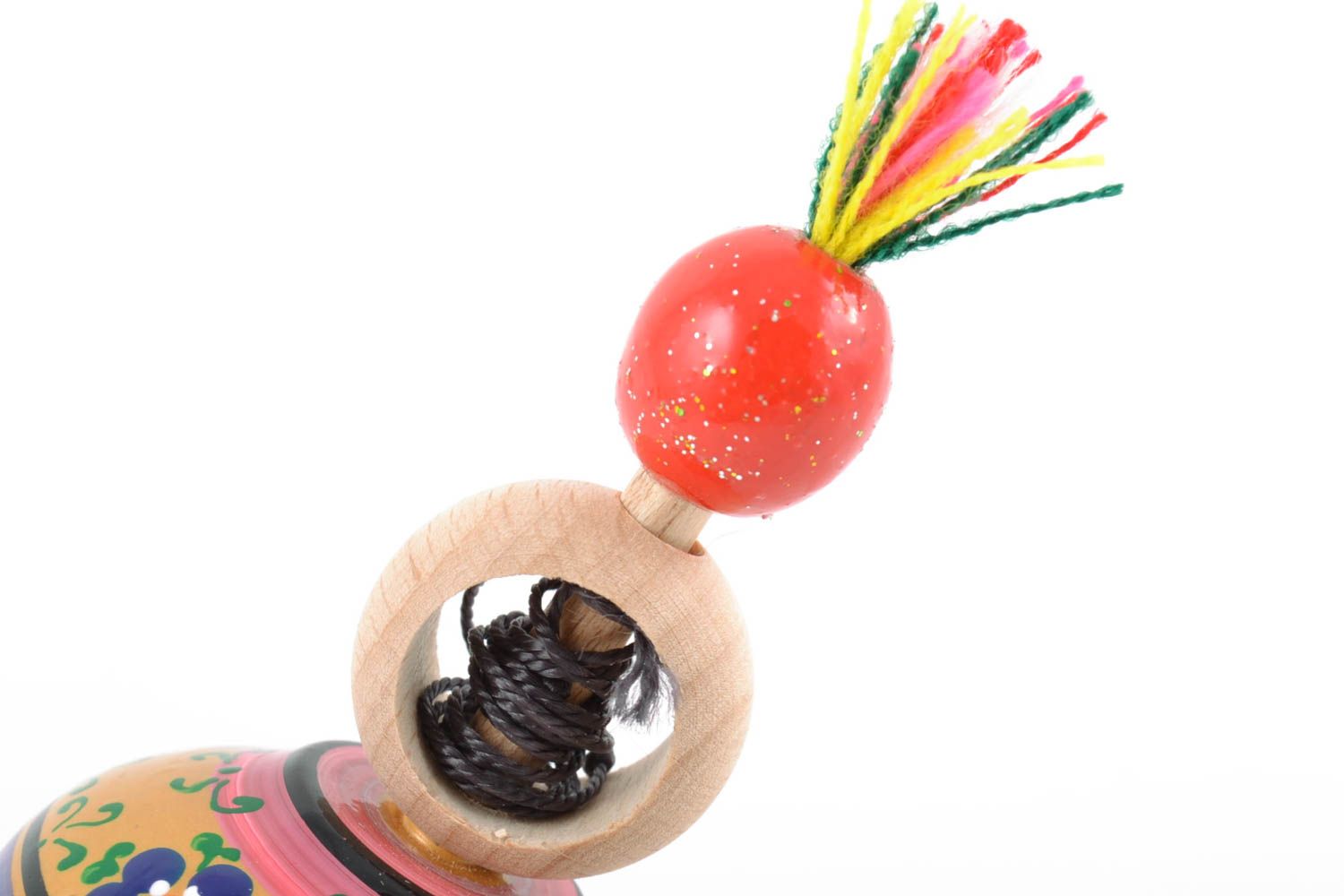 Ungewöhnliches Spielzeug Kreisel aus Holz bunt mit öko reinen Farben bemalt  foto 4