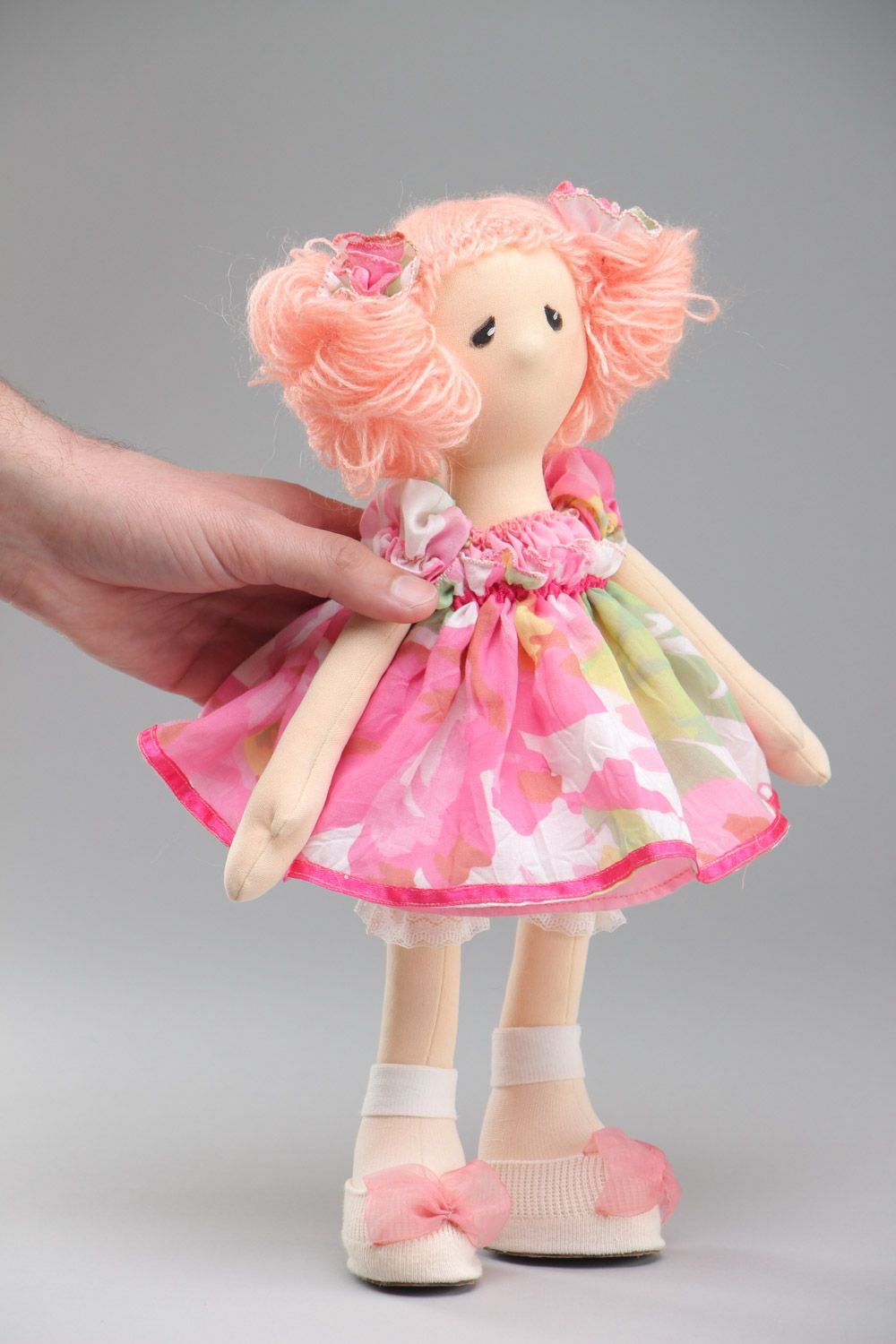 Handmade fabric soft doll of average size in pink dress  photo 5