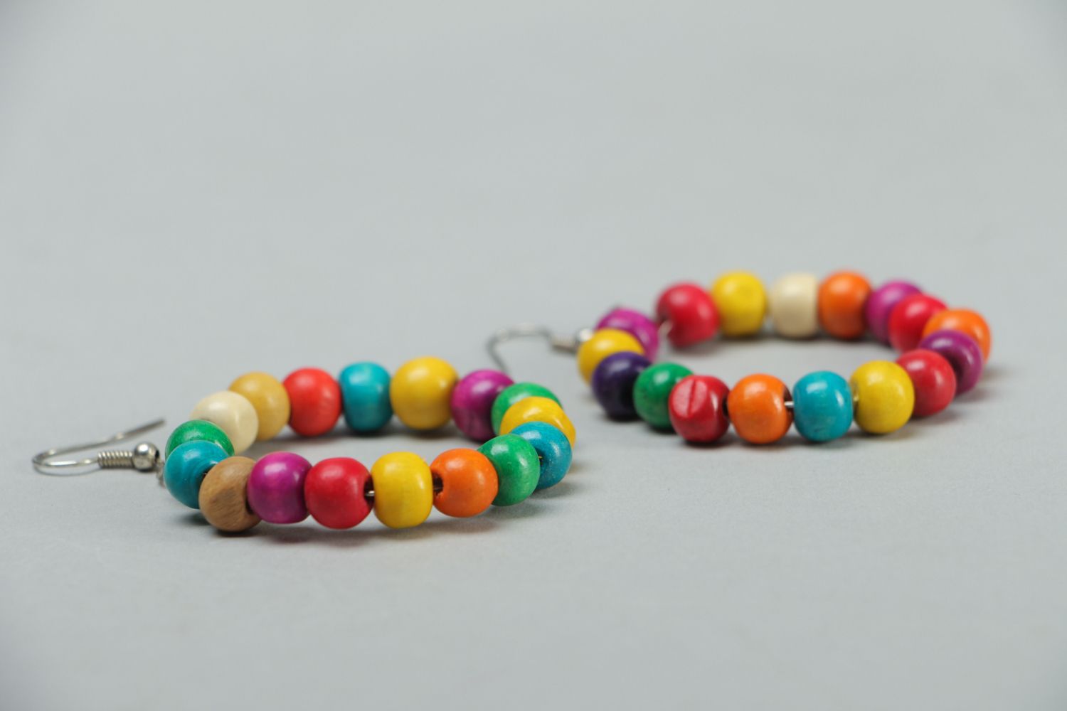 Large hoop earrings with colorful wooden beads photo 2