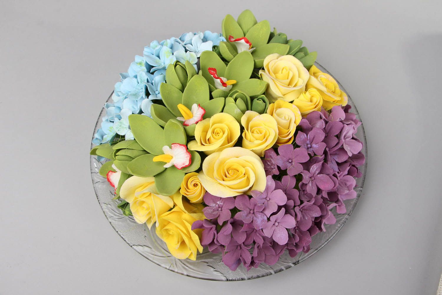 Dekorative Platte mit Blumen foto 1