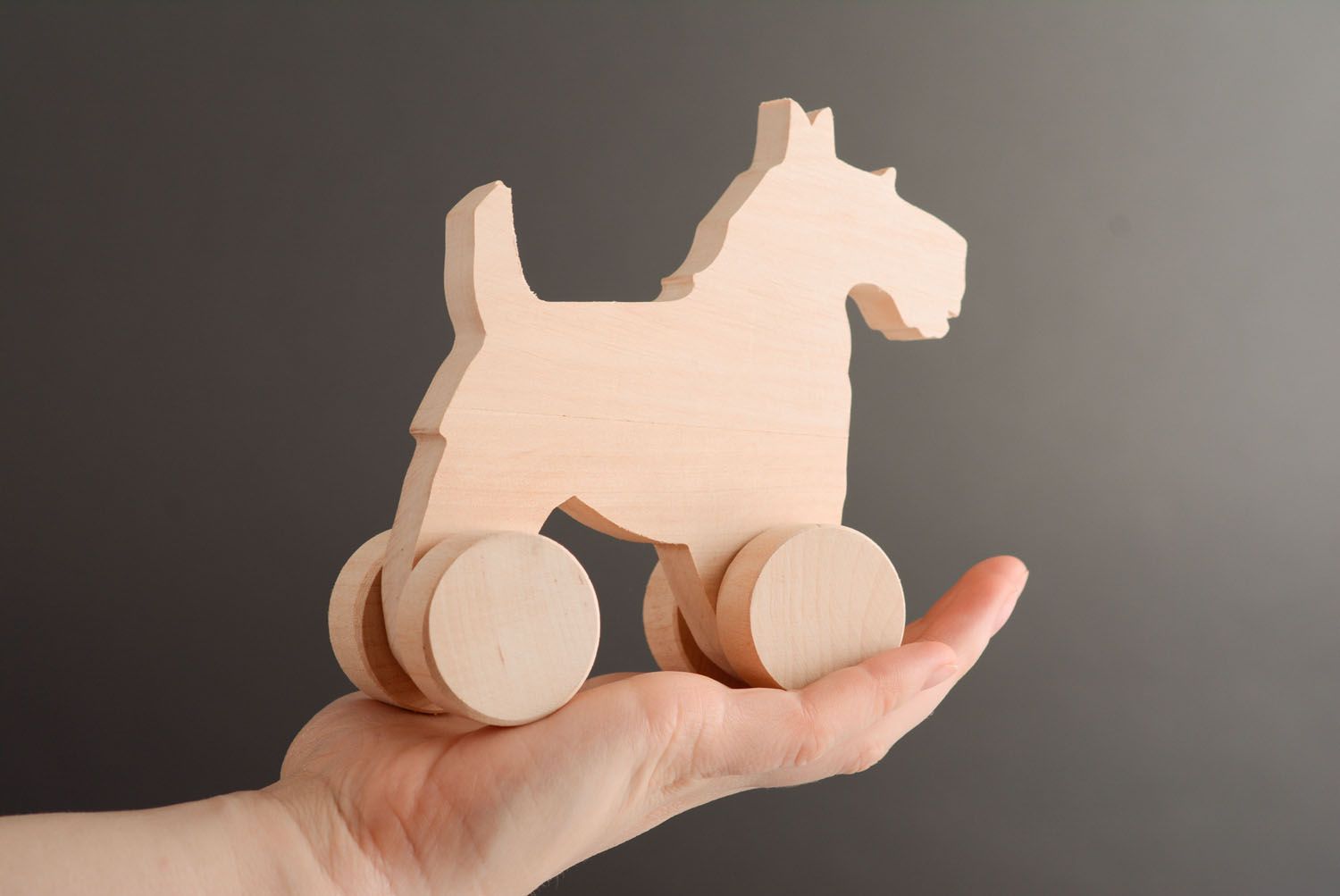 Wooden toy with wheels Doggie photo 3