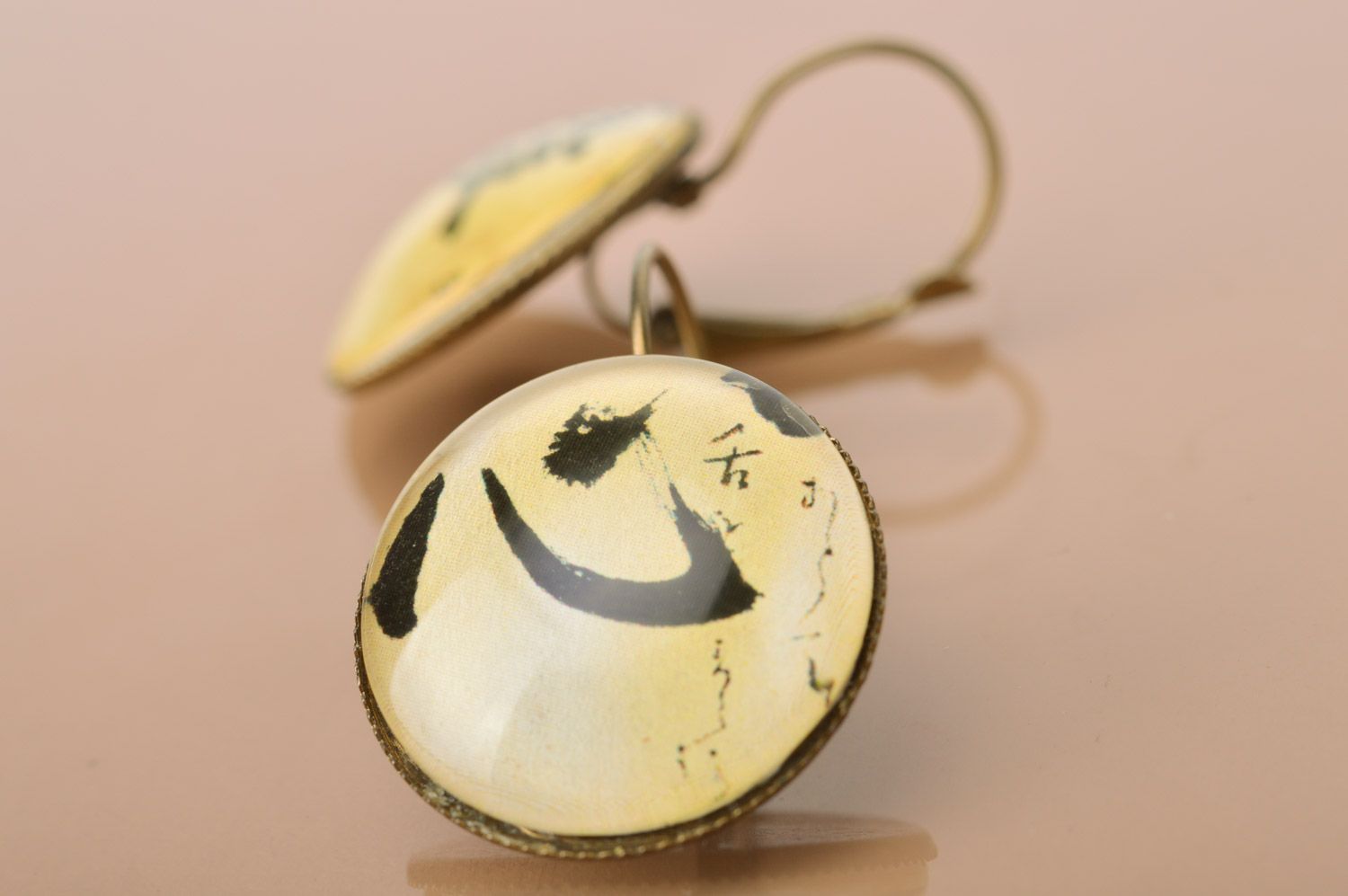 Handmade designer metal dangle earrings of round shape with print Hieroglyphs   photo 2