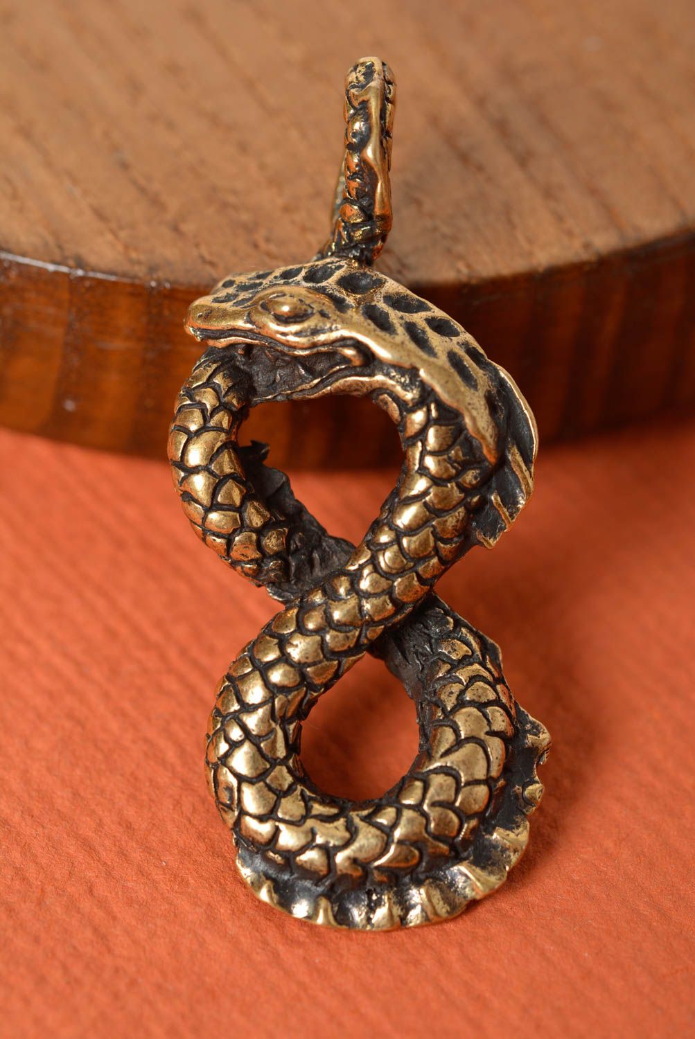 Beautiful handmade designer bronze neck pendant in the shape of snake Infinity photo 1