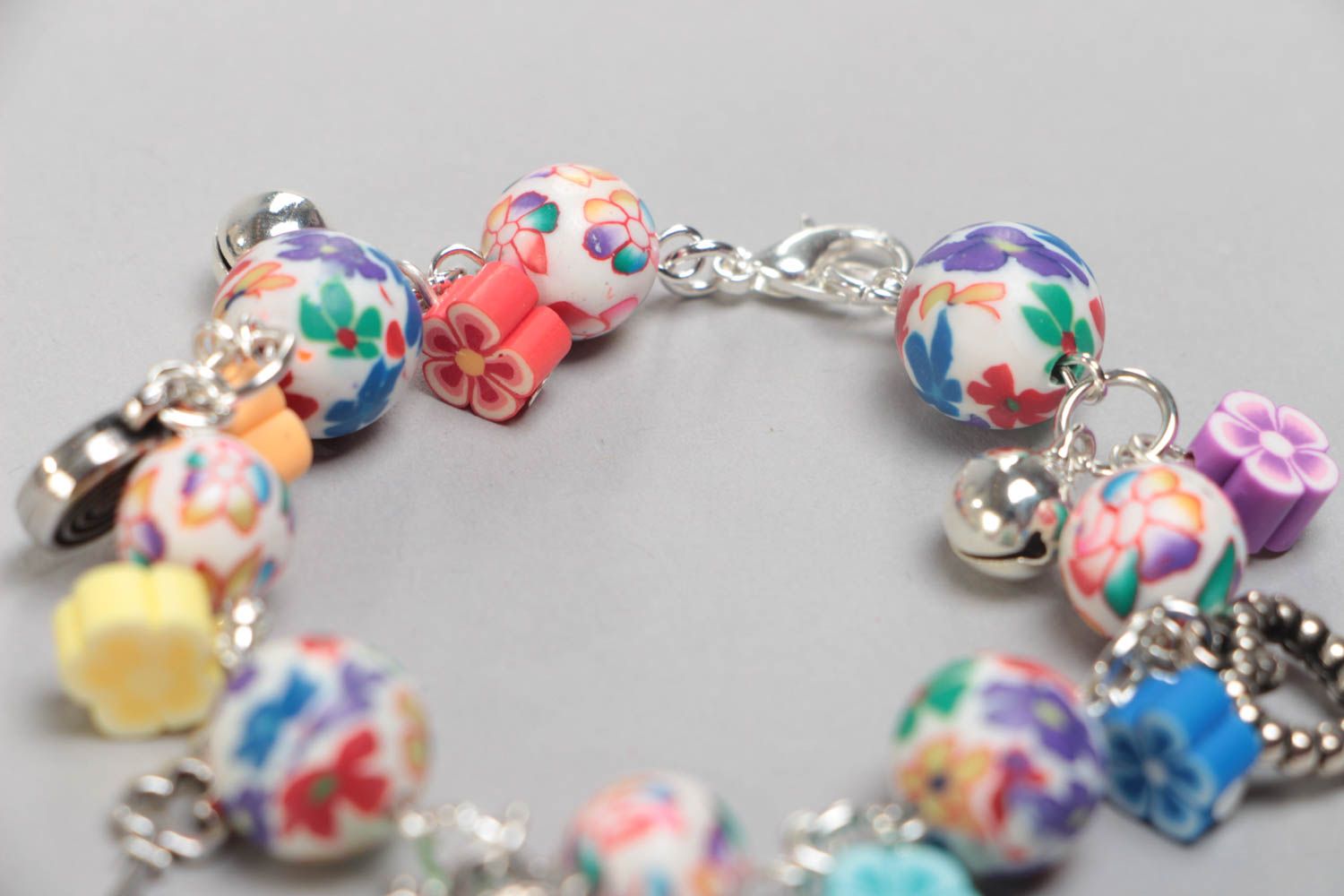 Beautiful eye-catching children's handmade plastic bracelet with charms photo 4