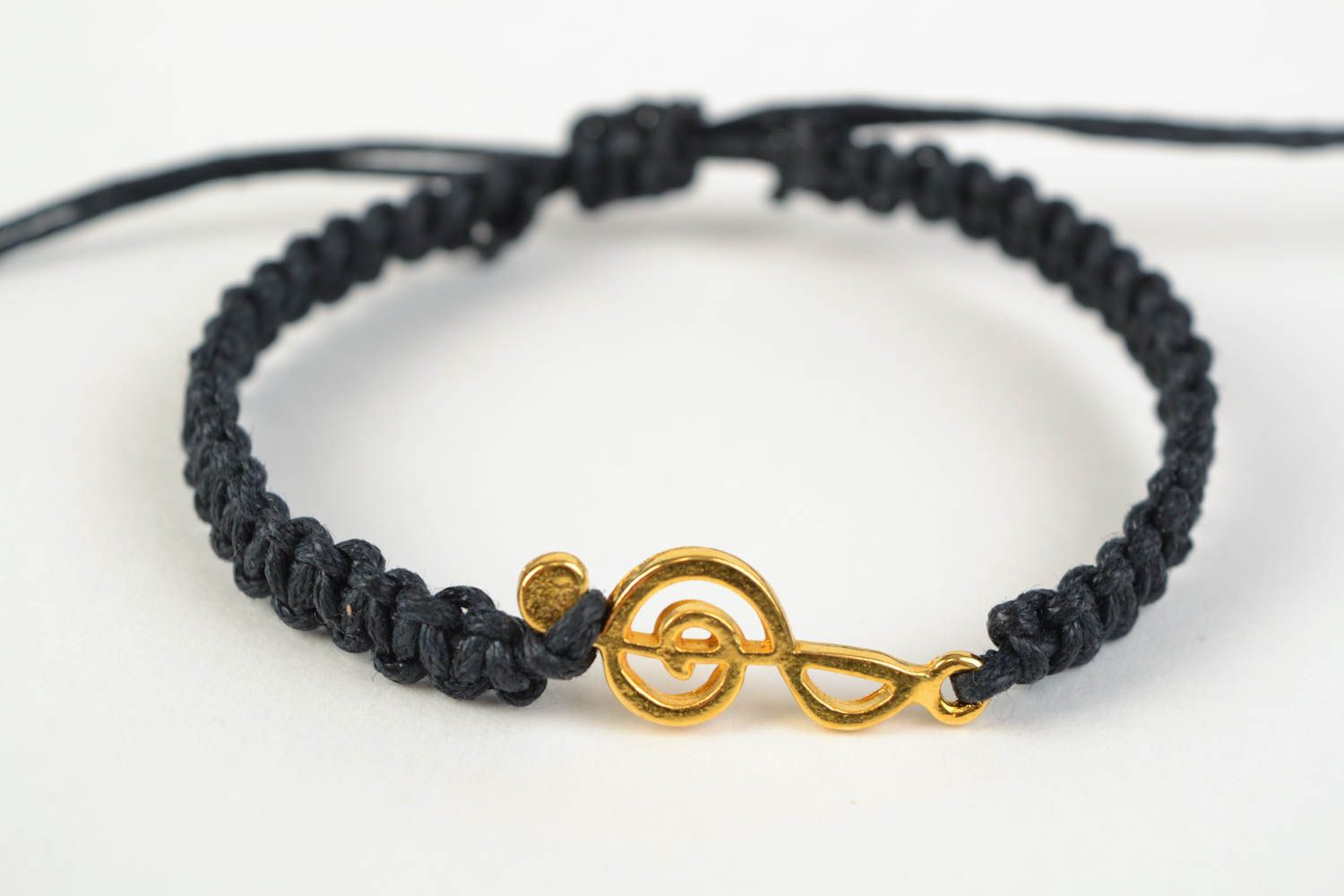 Handmade stylish bracelet made of cotton cord black with metal charm photo 3