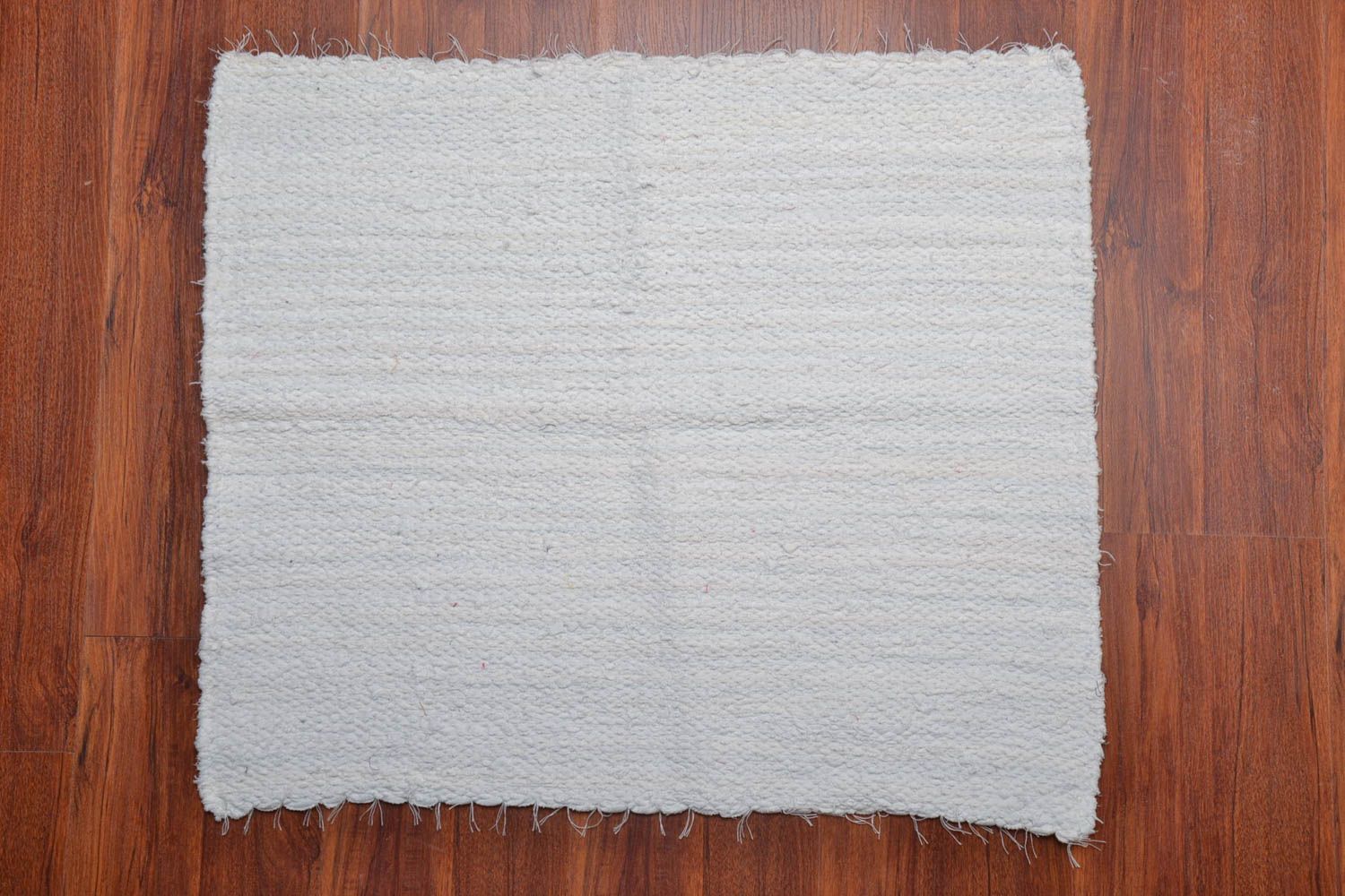 Weißer Teppich aus Stoff foto 1