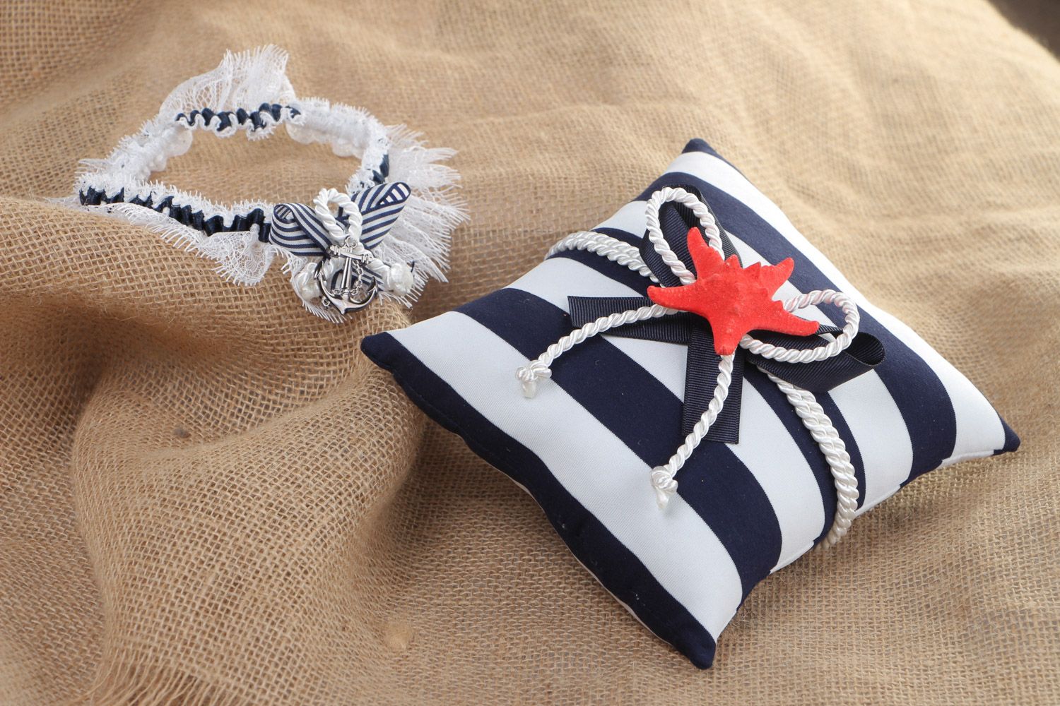 Set of handmade wedding accessories in marine style ring pillow and bridal garter photo 1