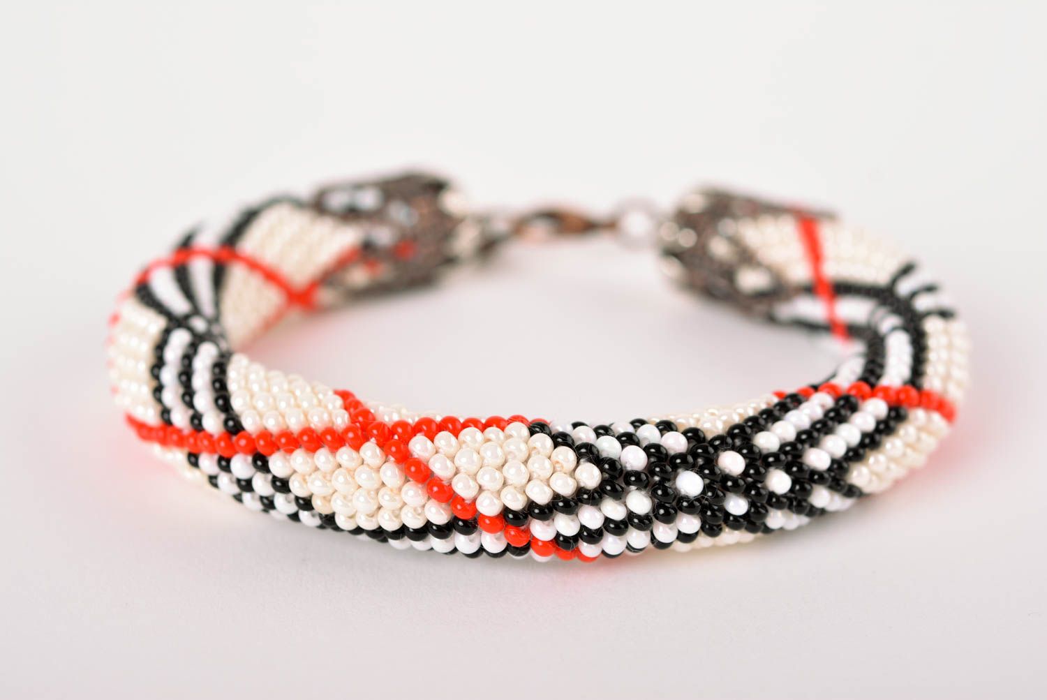 Handmade modern beaded cord all-size bracelet in white, black, red colors for women photo 1
