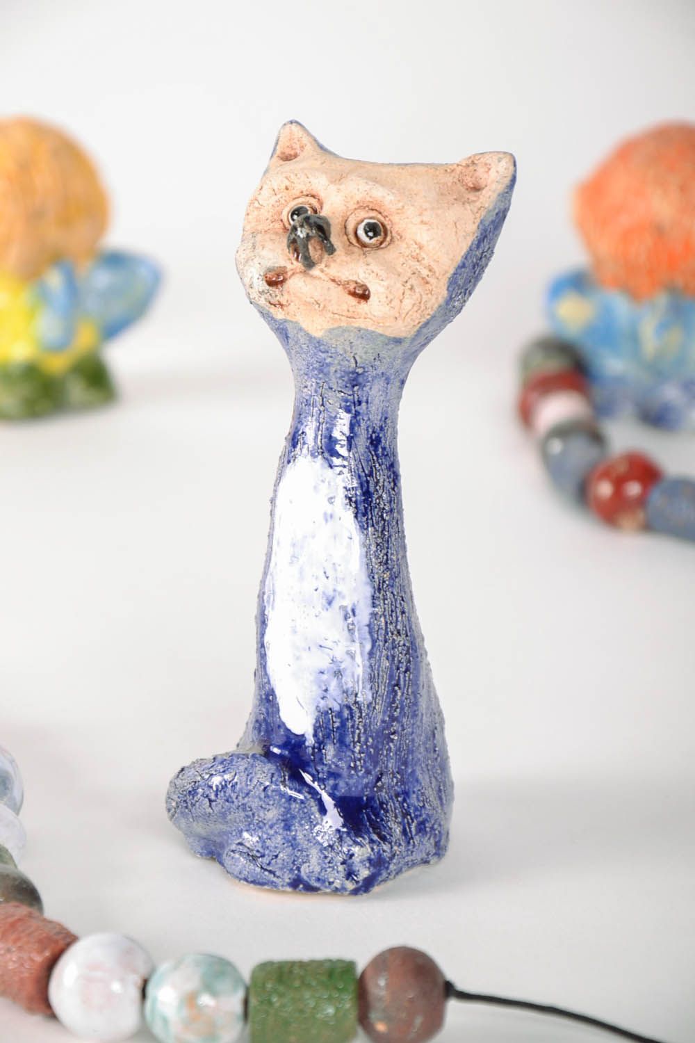 Bright ceramic figurine photo 1