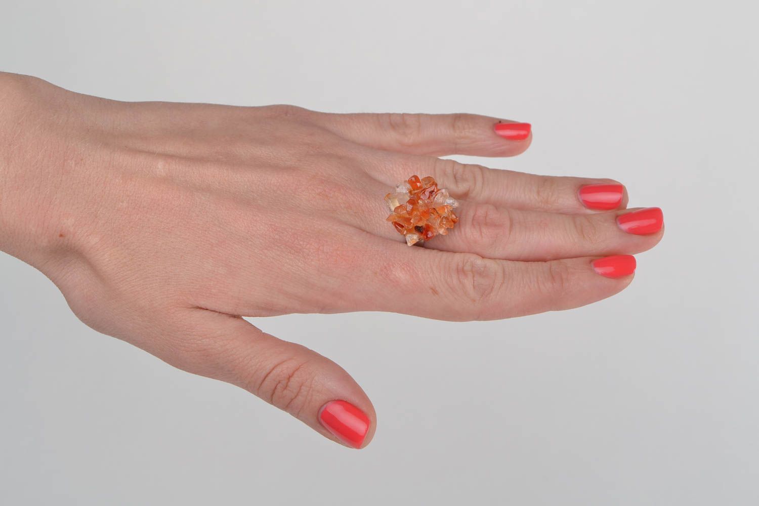 Beautiful handmade designer orange gemstone ring with metal basis photo 1