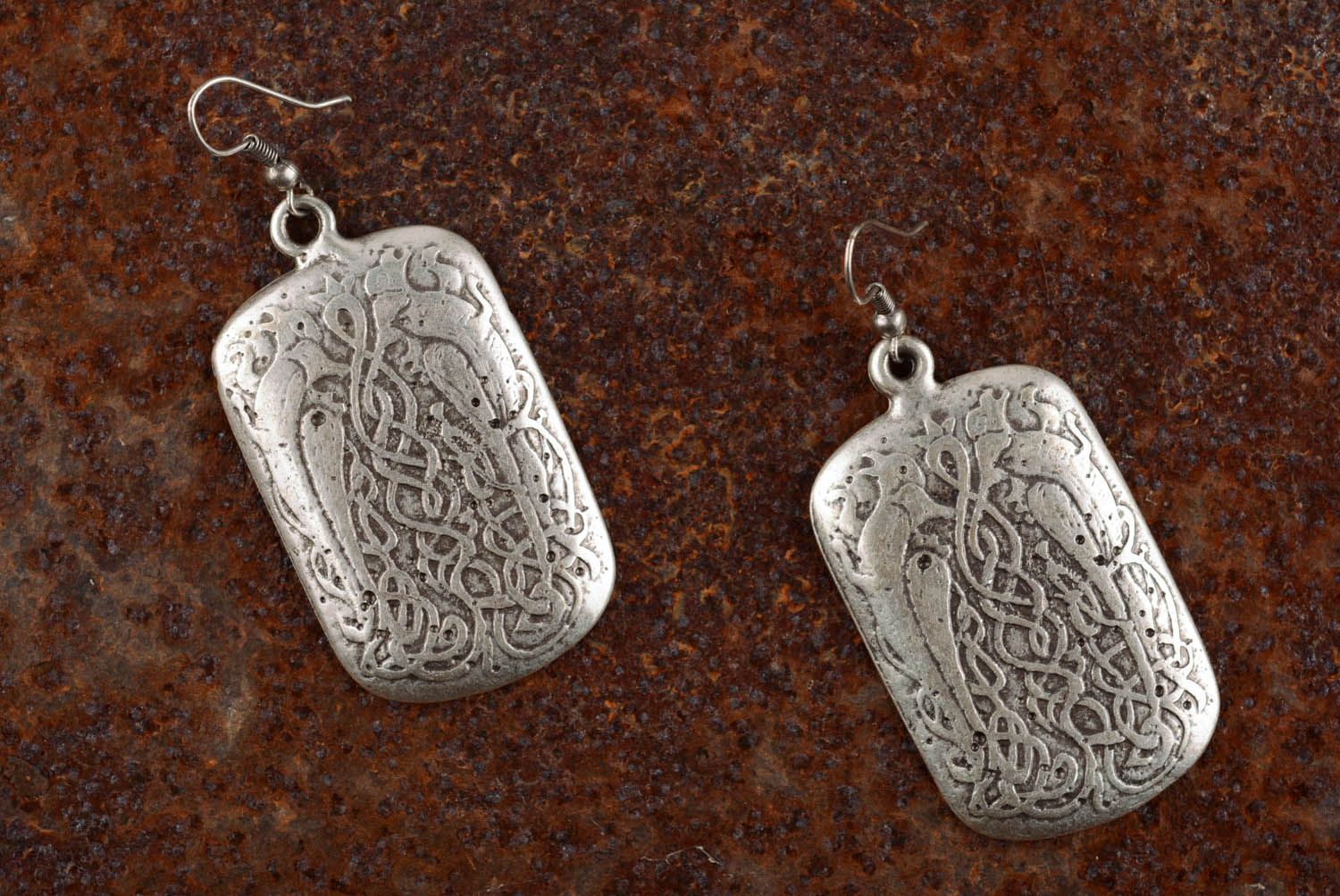 Metal earrings with pendants photo 1