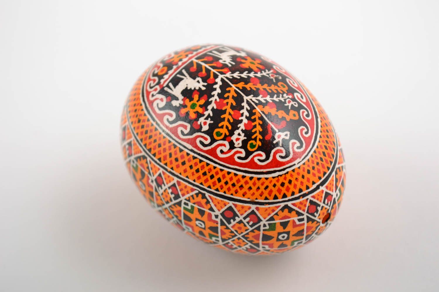 Handmade painted Easter egg with pattern in orange color palette home decor photo 3