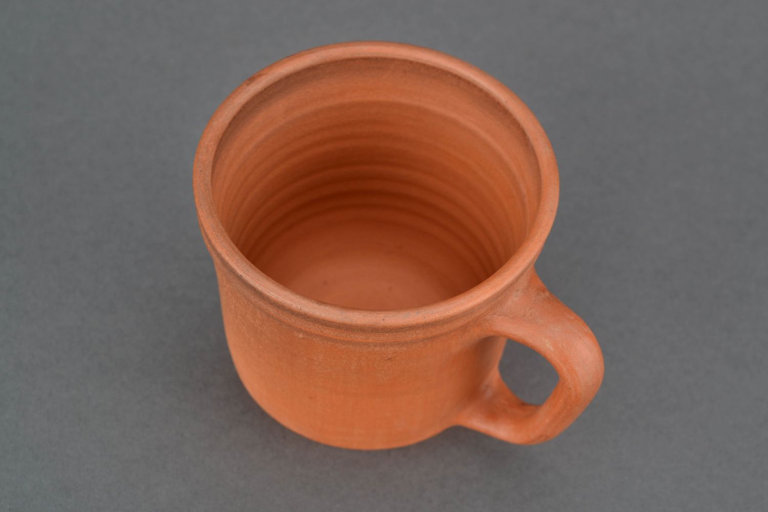 10 oz classic style clay Mexican coffee cup in terracotta color with handle and no pattern photo 3