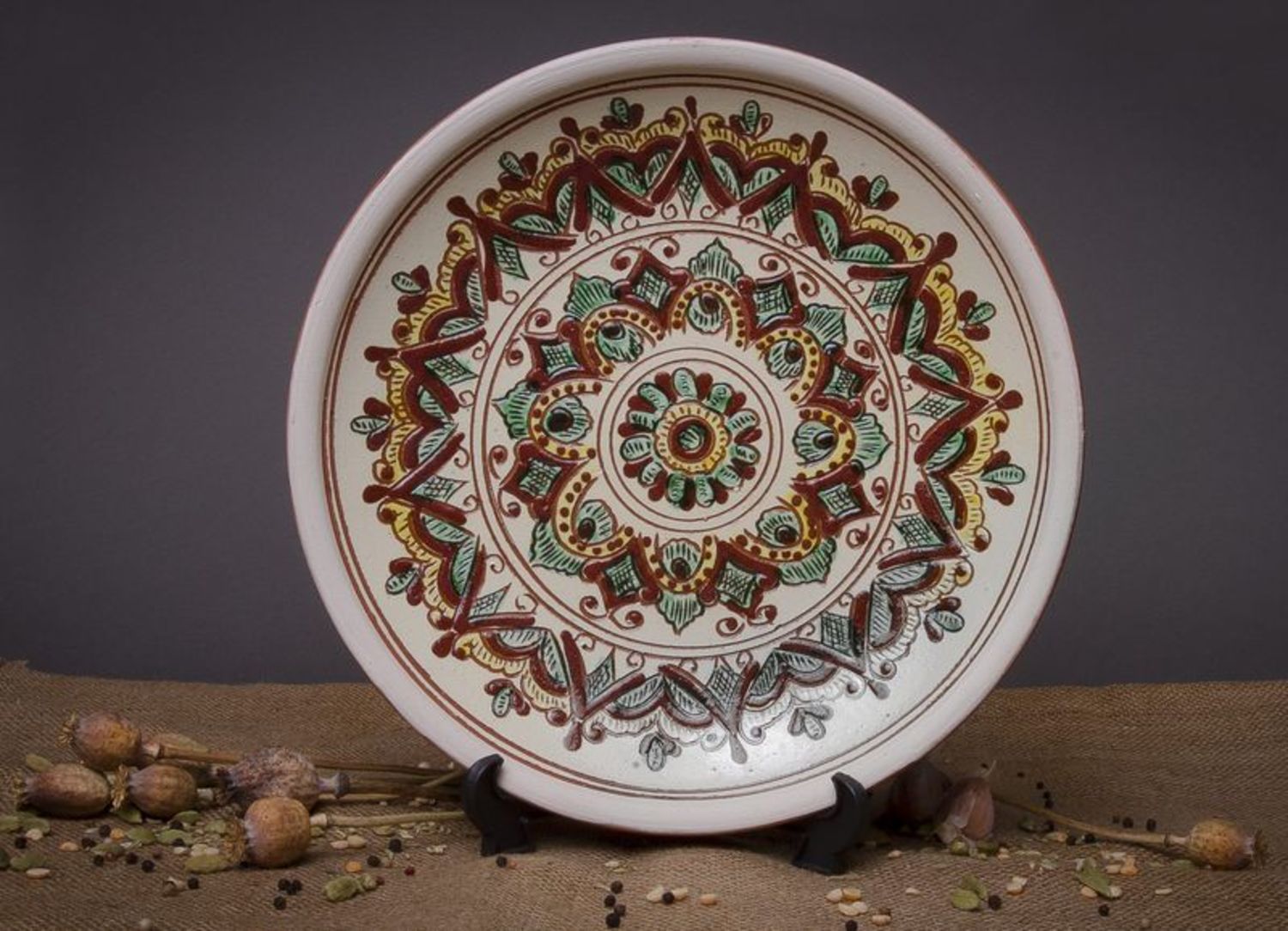 Decorative ceramic plate with pattern photo 1
