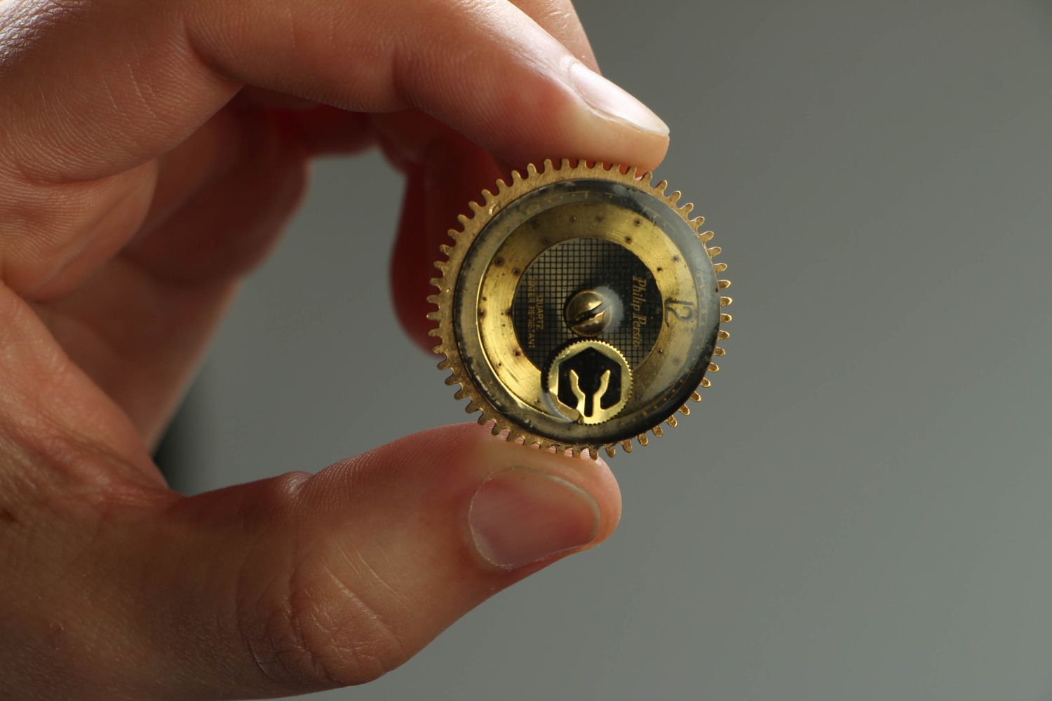 Metal steampunk brooch with clockwork mechanism photo 4