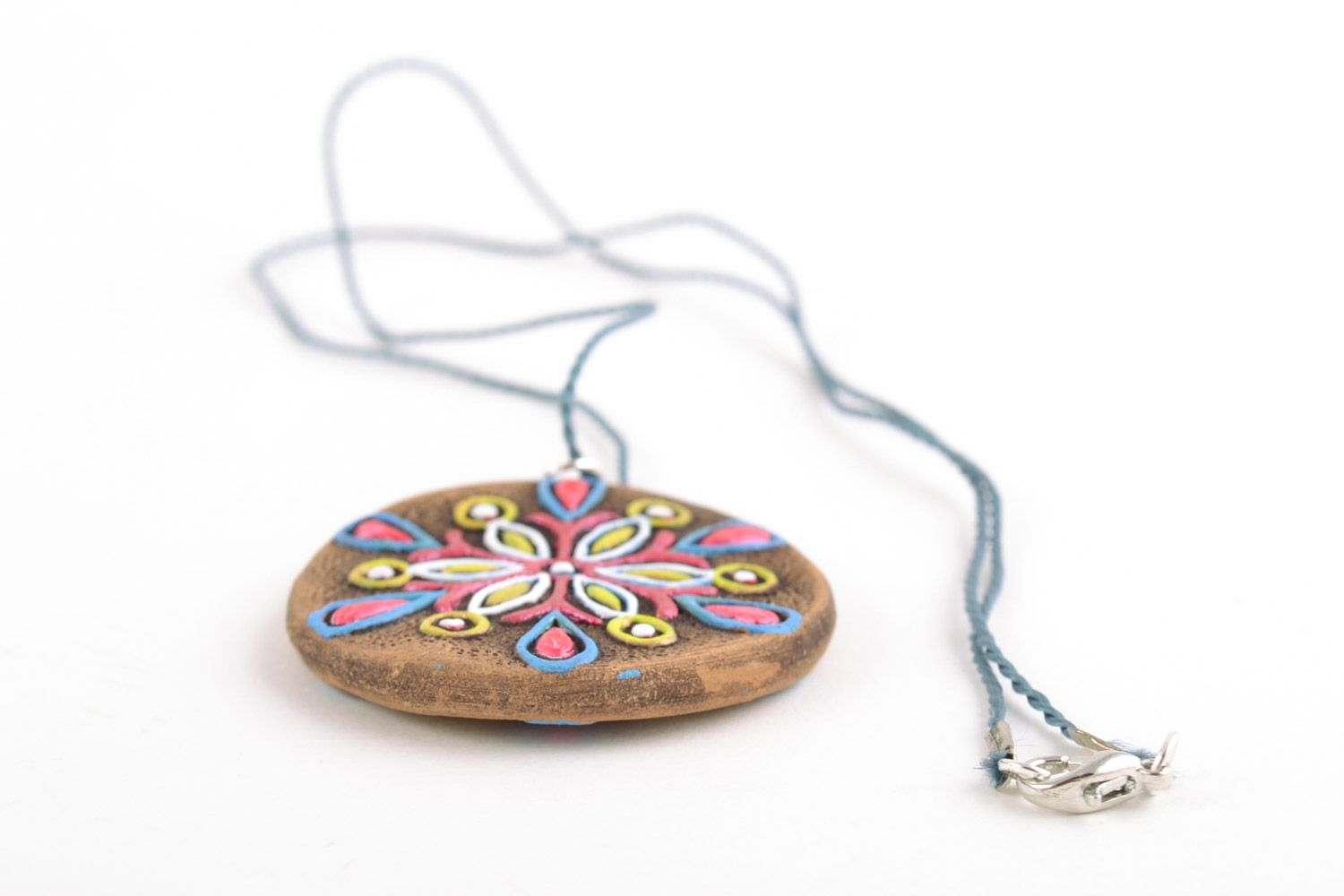 Round handmade clay neck pendant painted with acrylics with flower photo 3