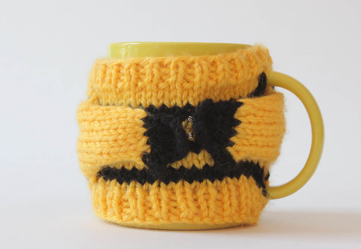 Cup in yellow color with handle and knitted bee colors' cover photo 1