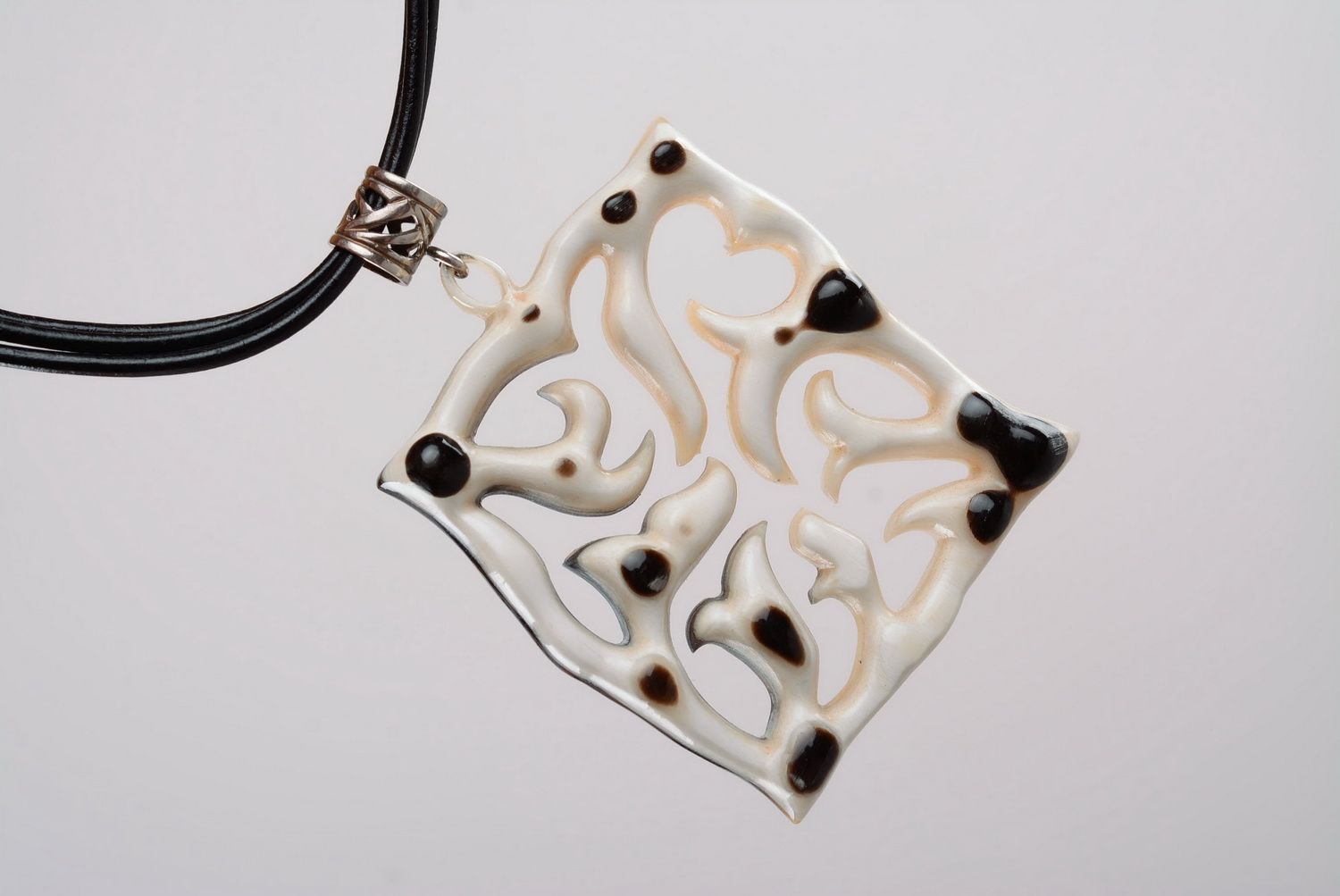 Lace pendant made of natural horn photo 5