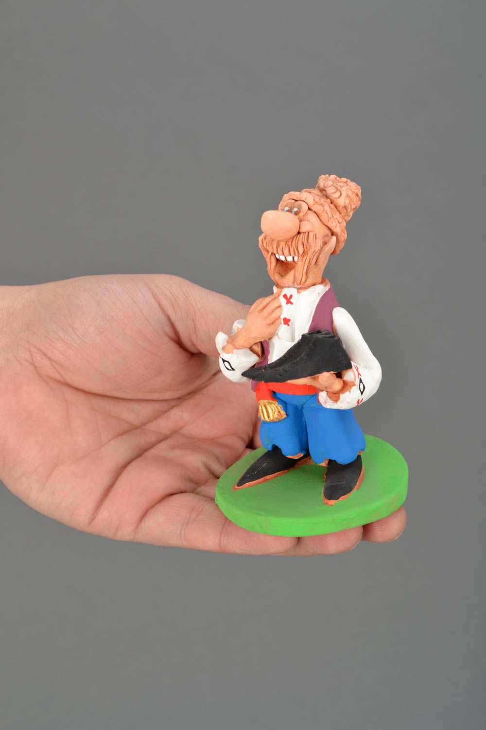 Ceramic figurine with painting Shoemaker photo 2
