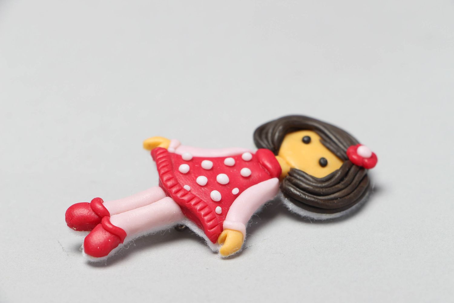 Plastic brooch in the shape of doll Polina photo 2