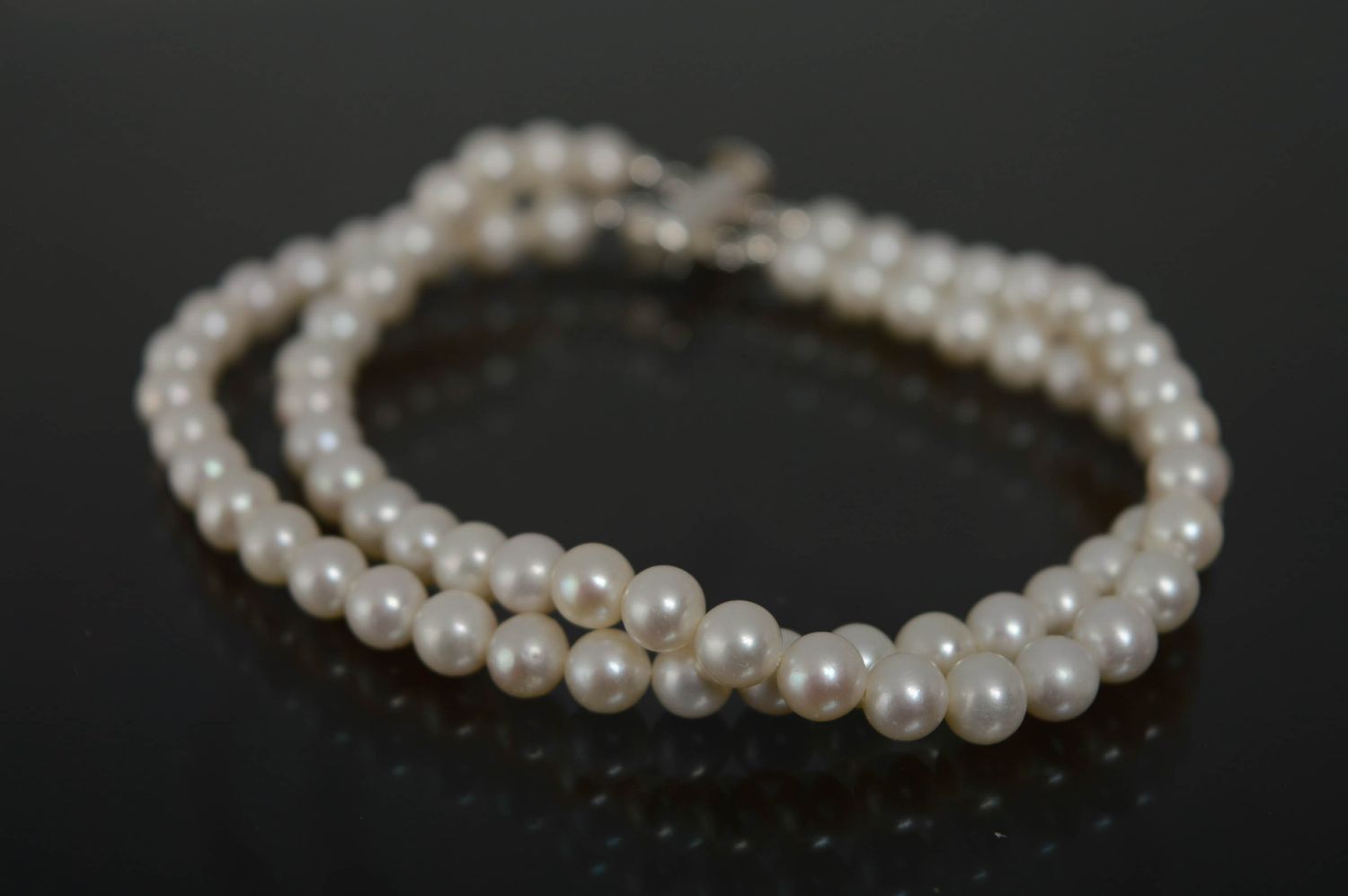 Pulsera de perlas artesanal foto 1