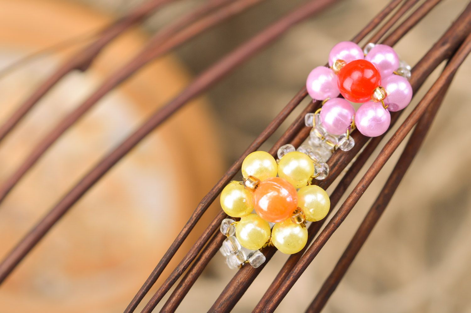 Set of handmade children's beaded rings in the shape of flowers 2 items pink and yellow photo 1