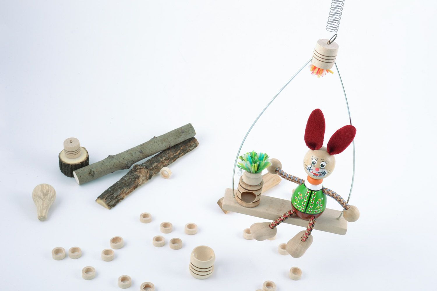 Designer small painted wooden eco toy rabbit sitting on bench handmade for kids photo 2