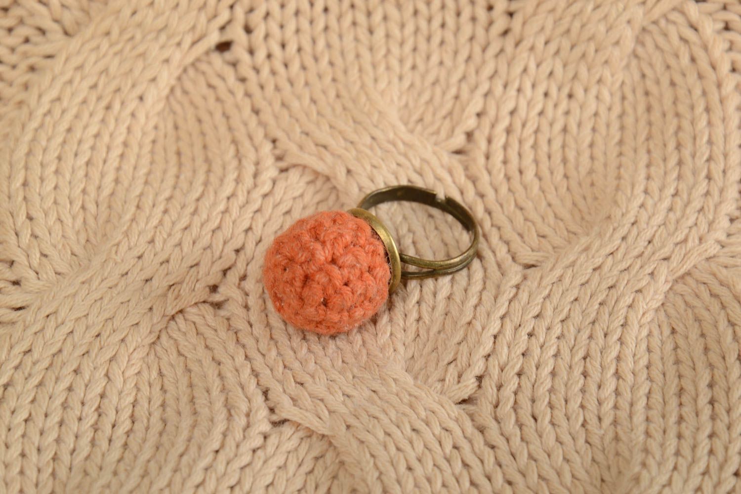 Handmade designer jewelry ring on metal basis with crocheted orange bead photo 1