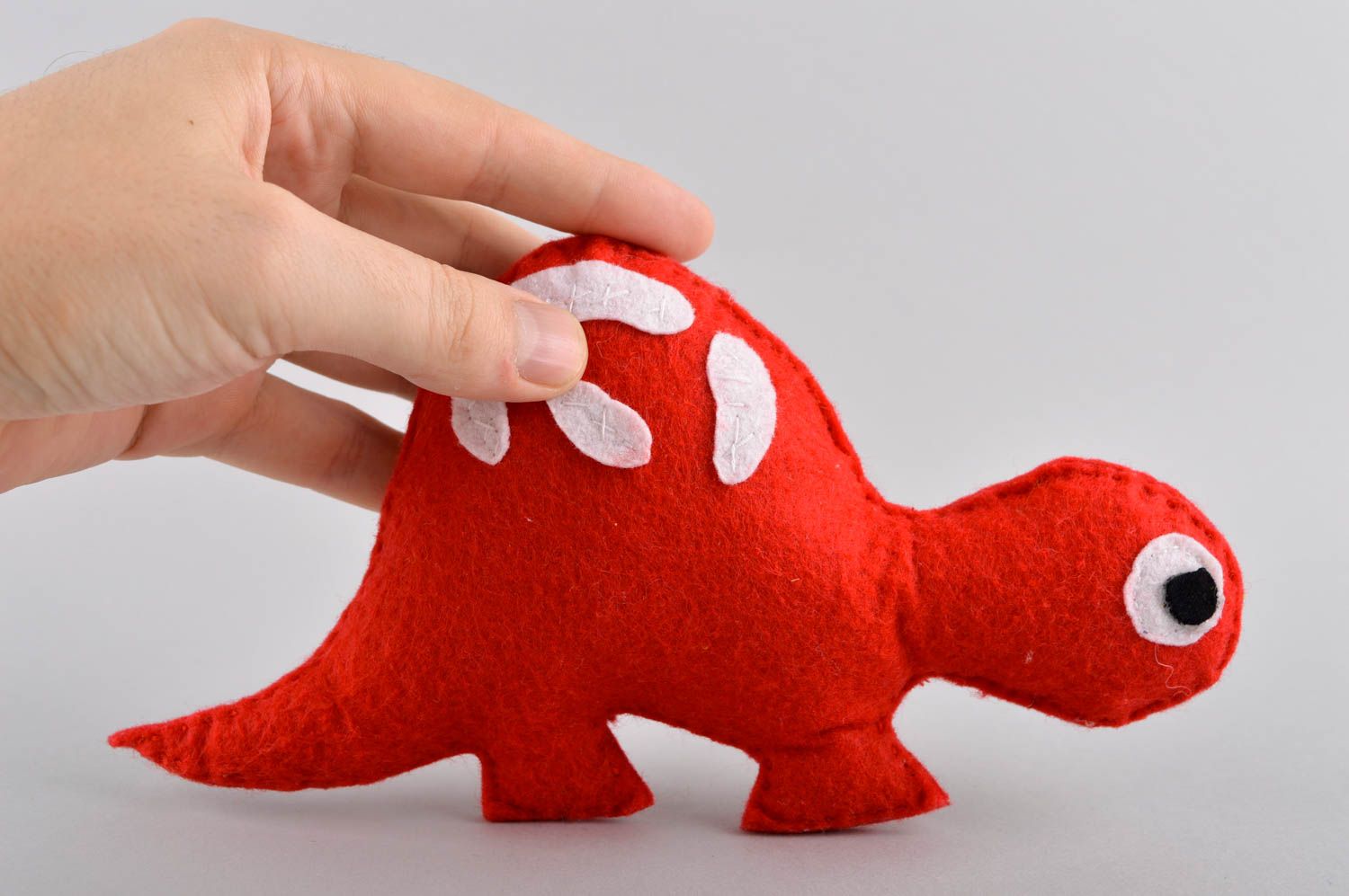 Handmade natürliches Spielzeug Geschenk Idee Dino Kuscheltier aus Filzwolle rot foto 5