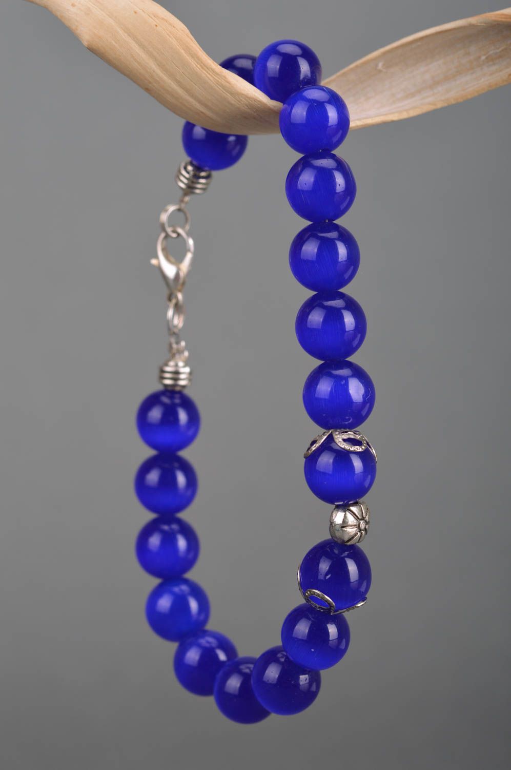 Handmade glass bead wrist bracelet of blue color for women designer laconic photo 3