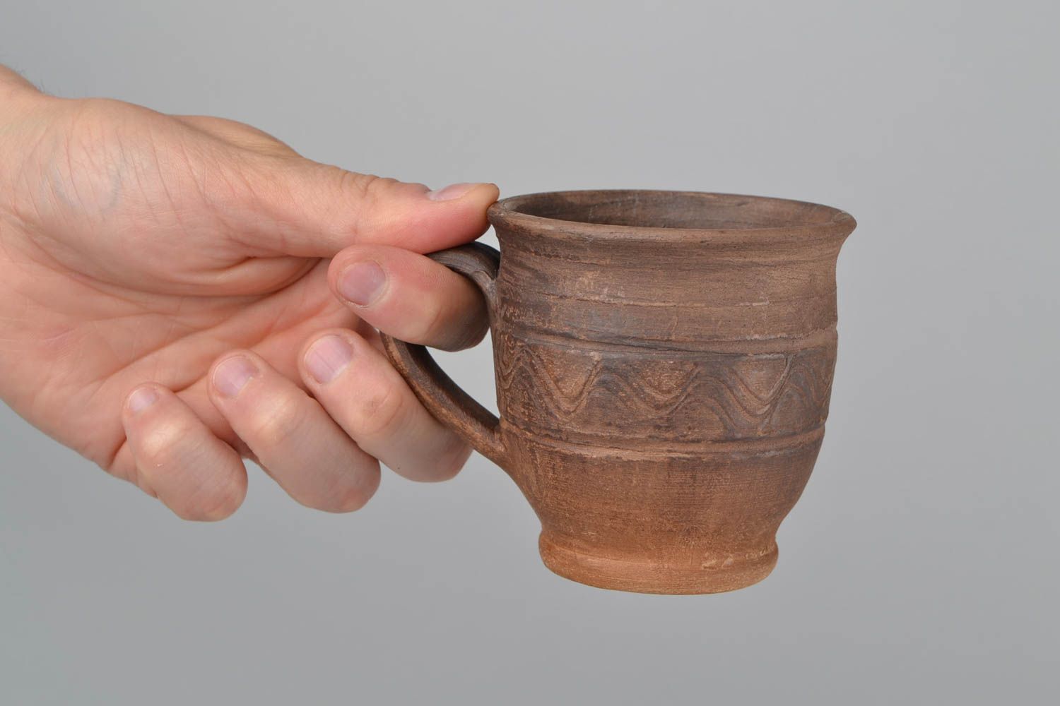 Umweltfreundliche handmade Kaffeetasse aus Keramik Volumen 200 ml braun schön foto 2