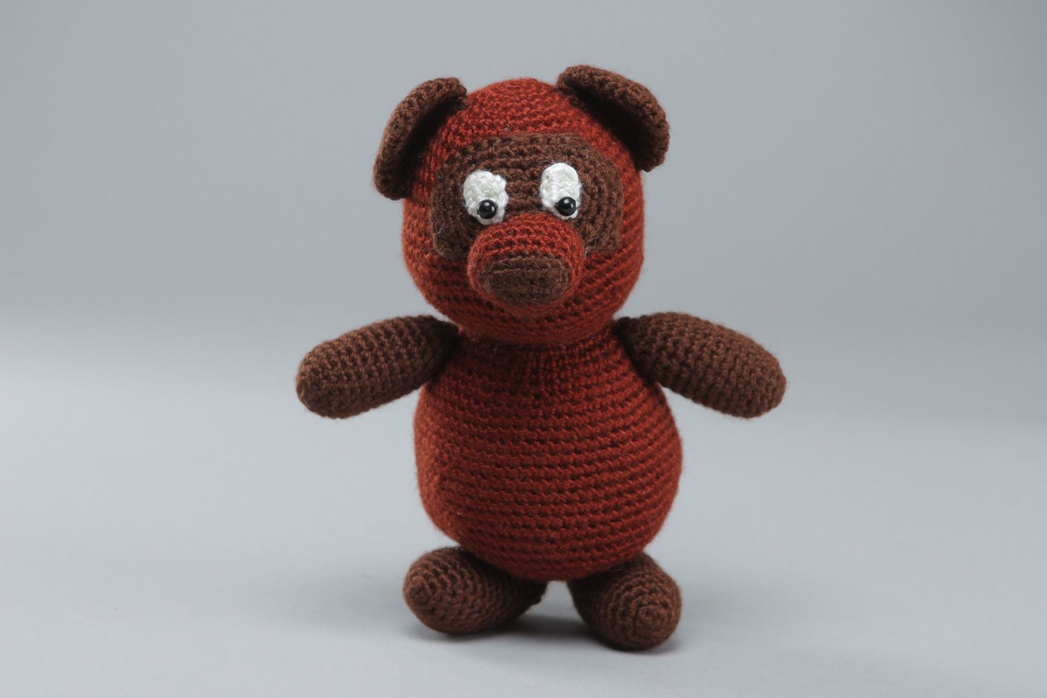 Cute handmade soft toy bear crocheted of brown acrylic threads for children photo 1