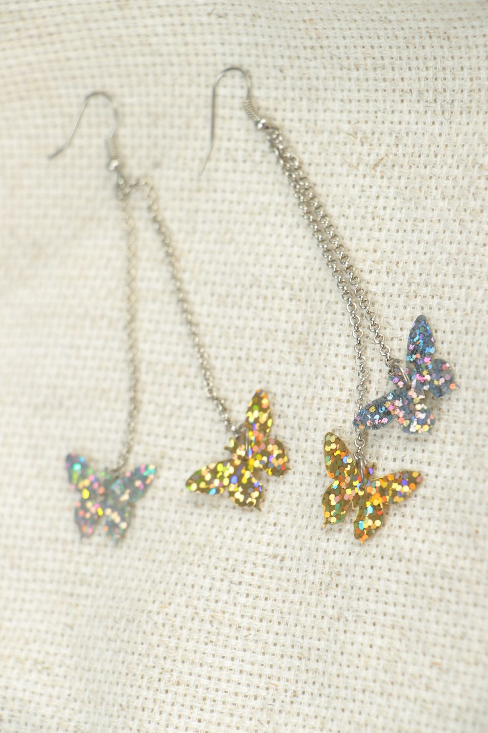 Metal earrings with charms in the shape of butterflies photo 4