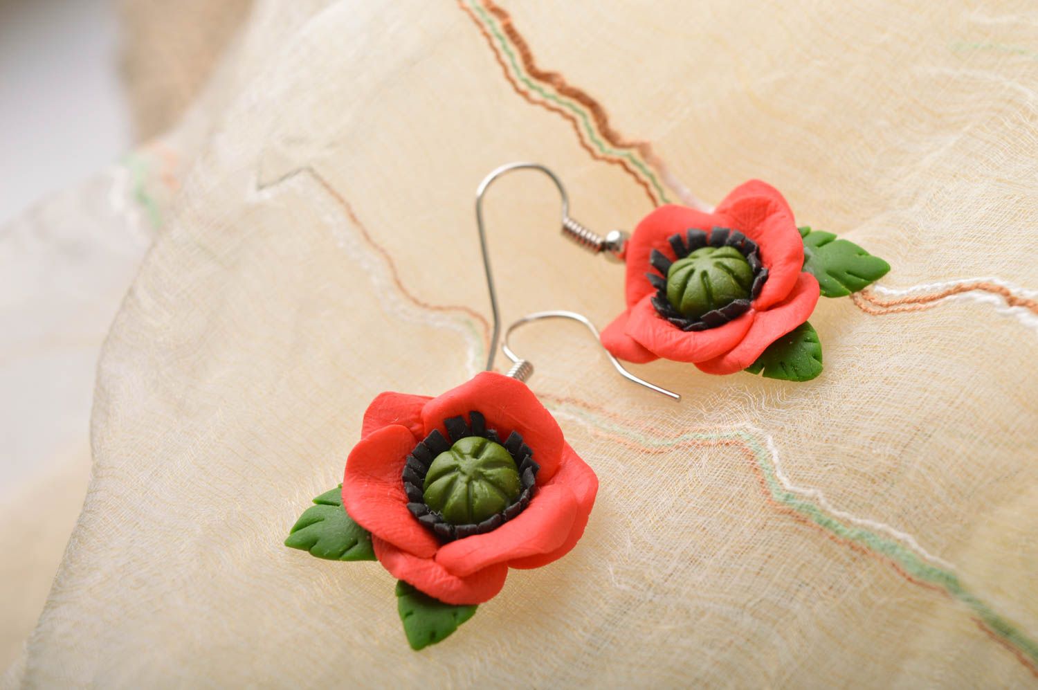 Handmade female big red and green flower earrings made of cold porcelain photo 1