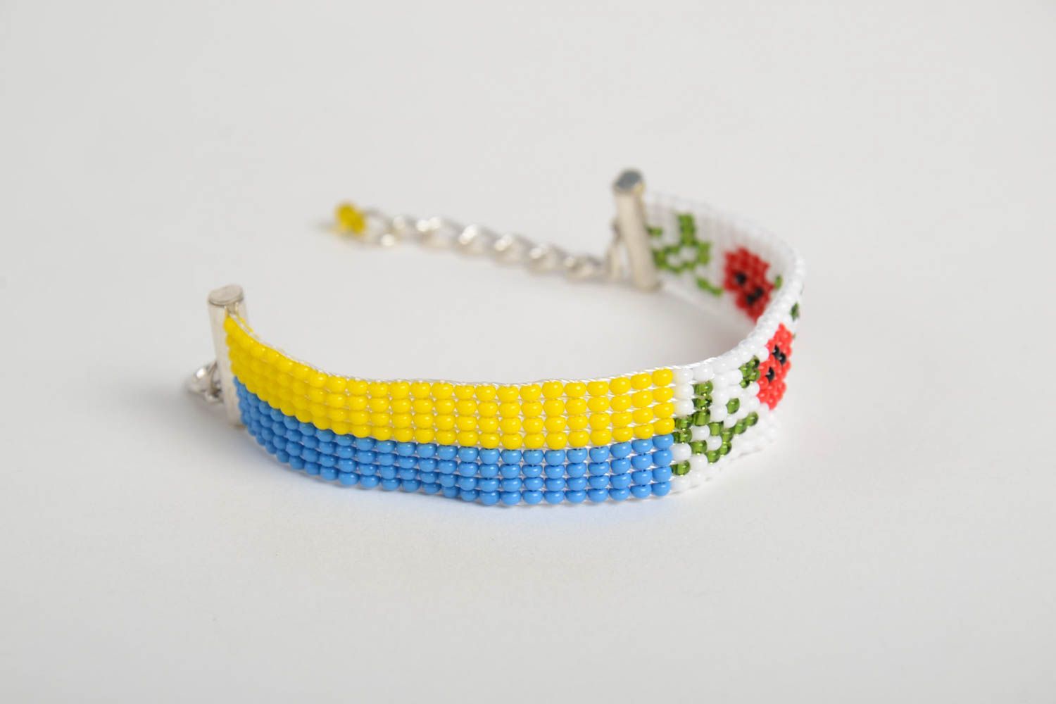 Bright beaded bracelet with the Ukrainian flag and floral ornament photo 5