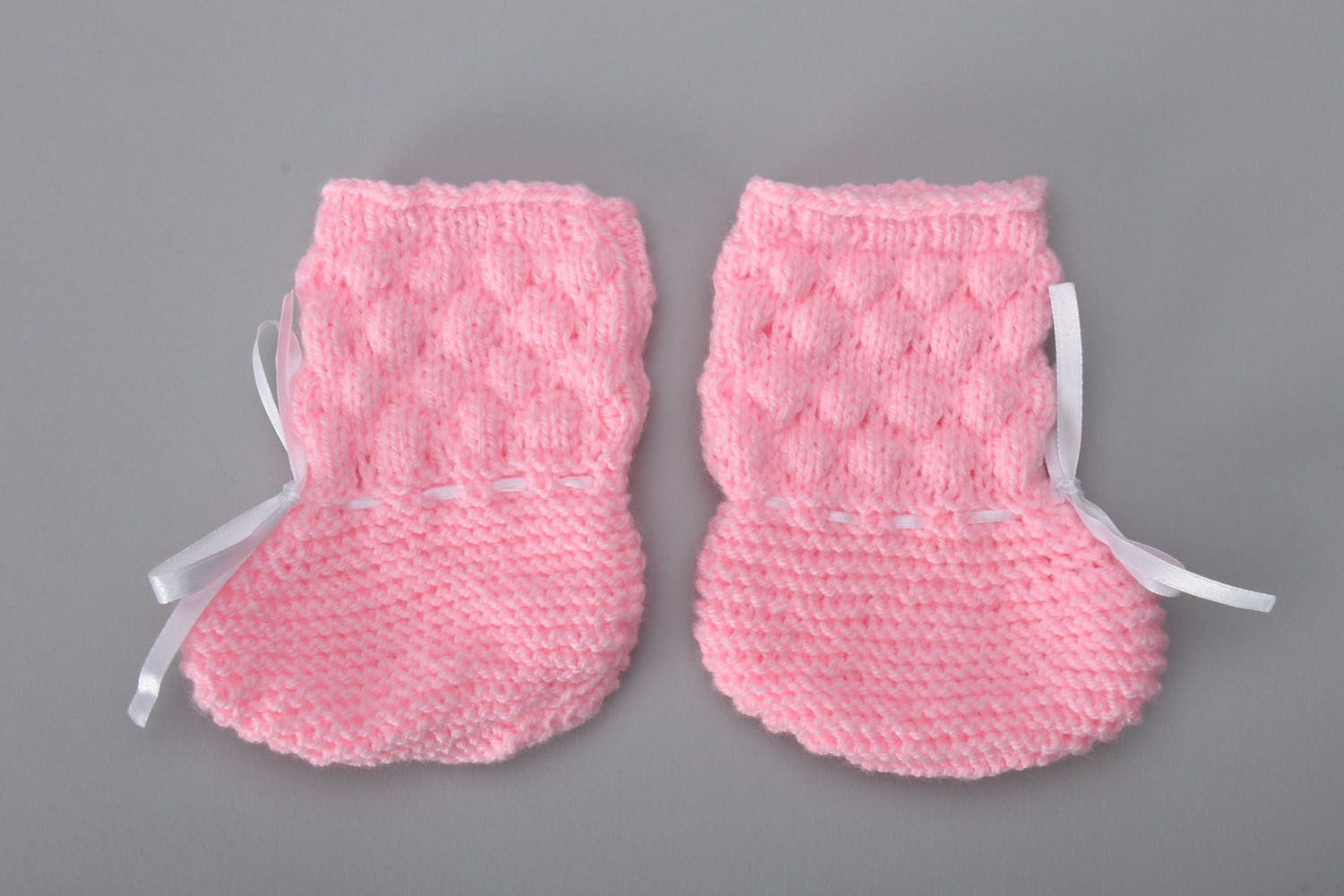 Pink knitted baby booties photo 2