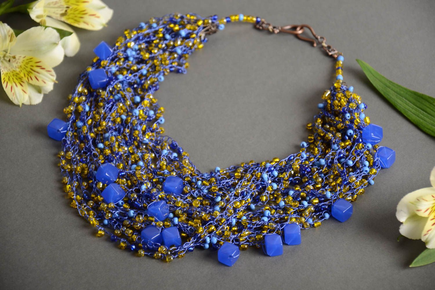 Handmade designer long airy crocheted beaded necklace with blue plastic beads photo 1