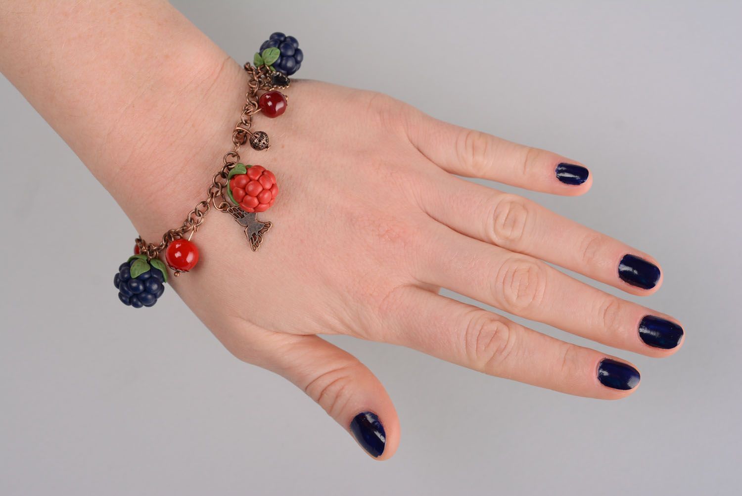 Plastic bracelet with charms in the shape of berries photo 2