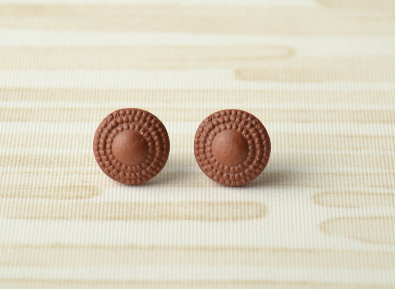 Round clay stud earrings with ornament photo 1